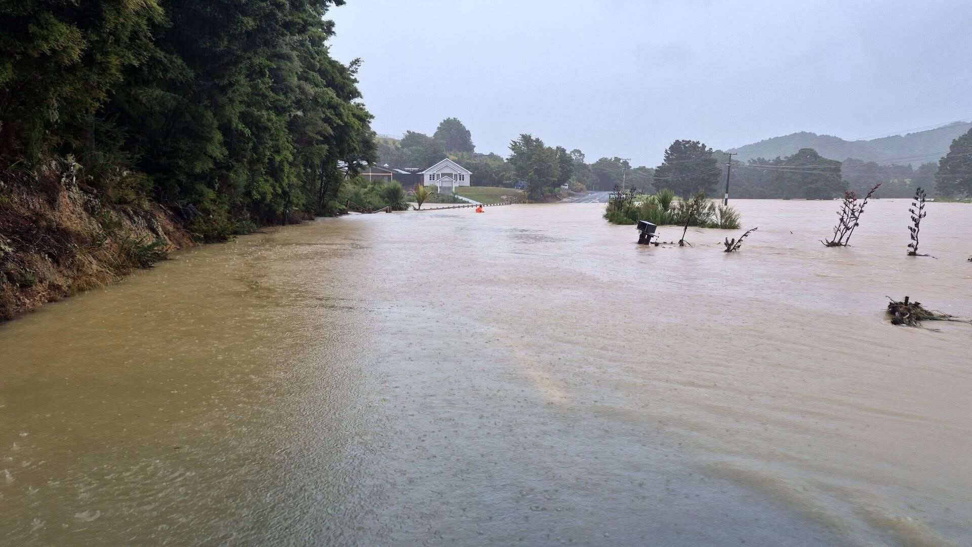 Whananaki Marae surrounded by floodwaters. Photo / Ck Waetford