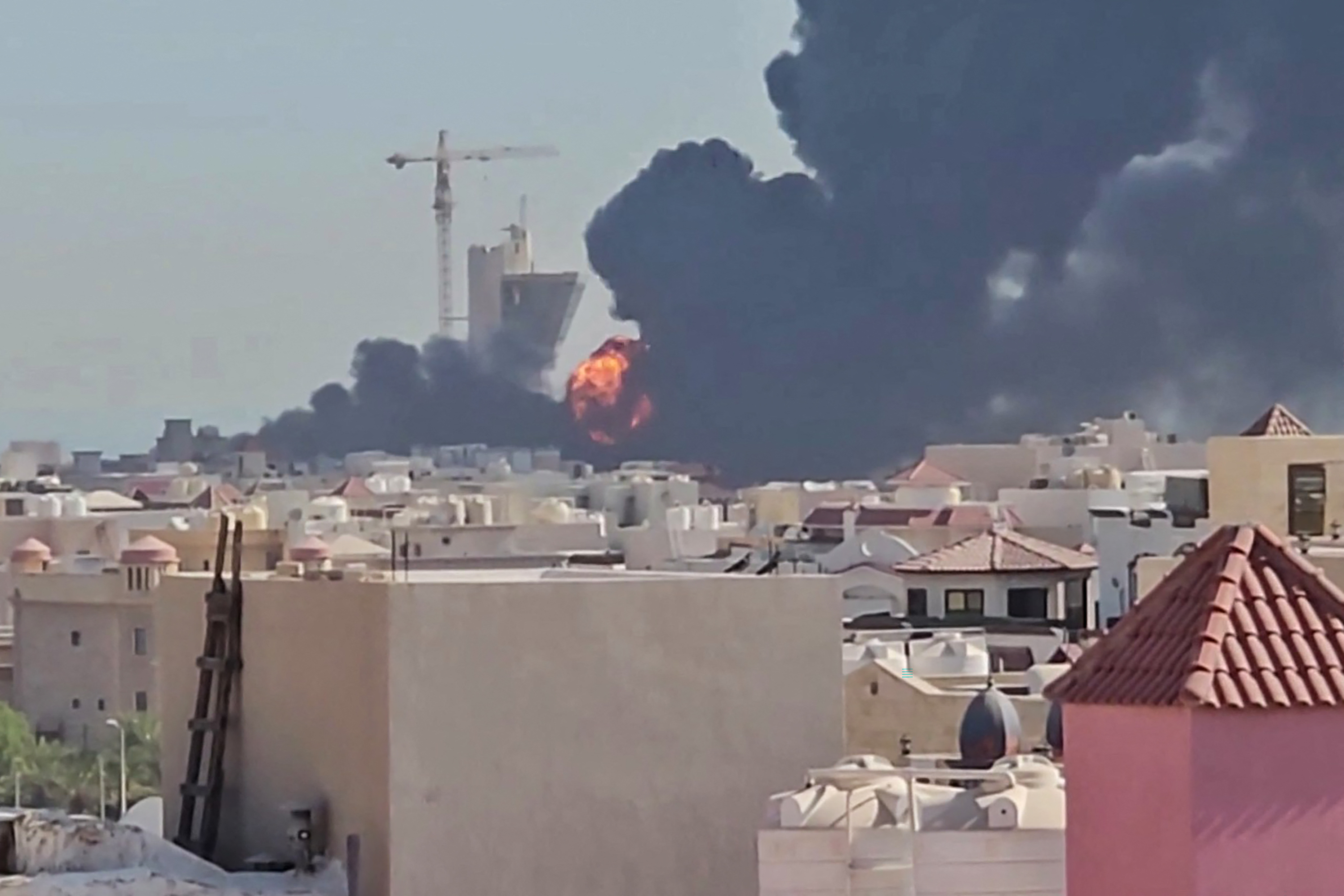 A fireball over the town of Mangaf, south of Kuwait City. Kuwait was one of several neighbours targeted by Iran overnight - attacks which killed two US soldiers in Jordan. Photo AFP