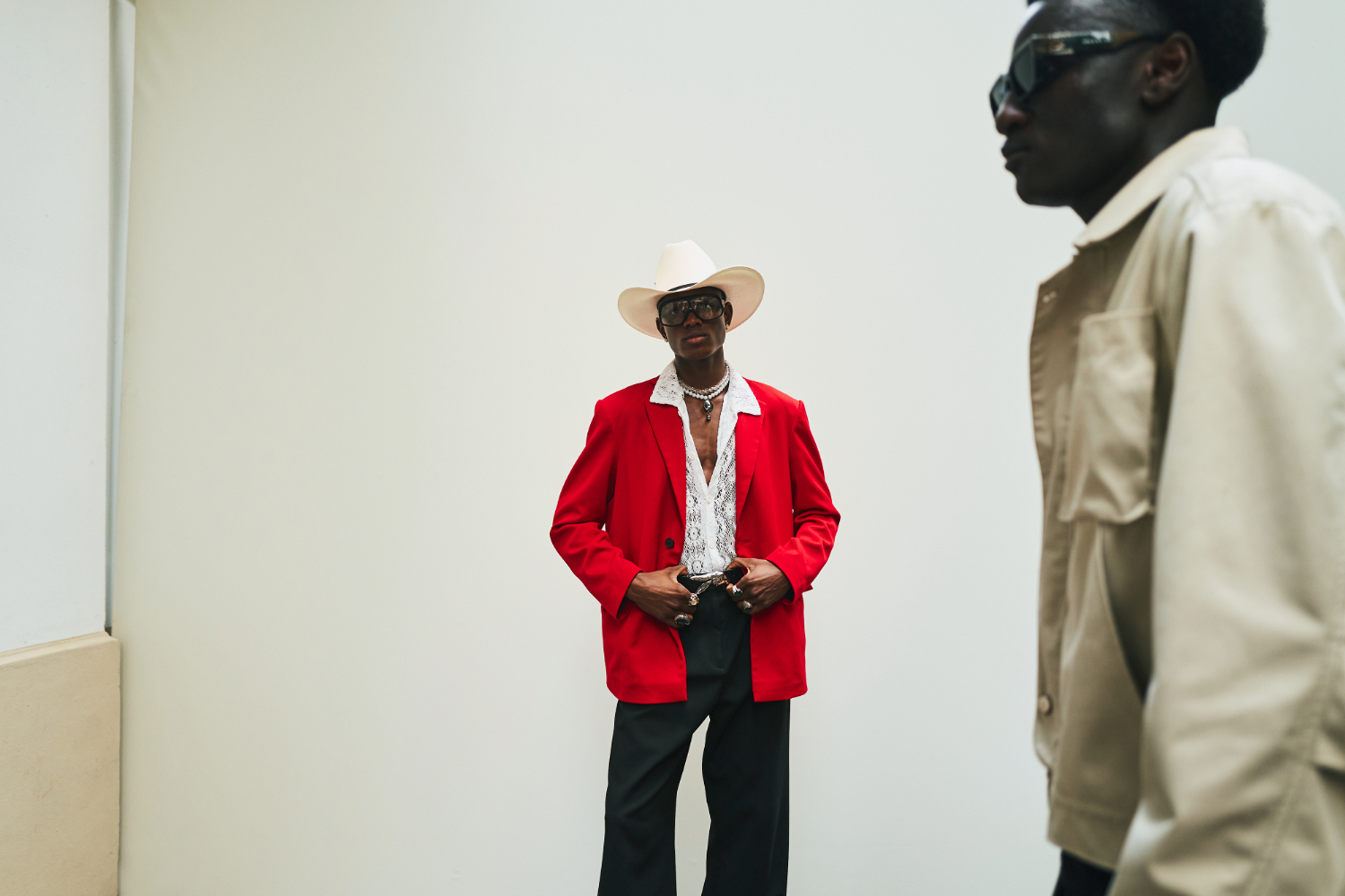 The lacy white shirt was a reminder of how some of the best Western-inspired outfits benefit from bucking convention. Photo / Simbarashe Cha for The New York Times