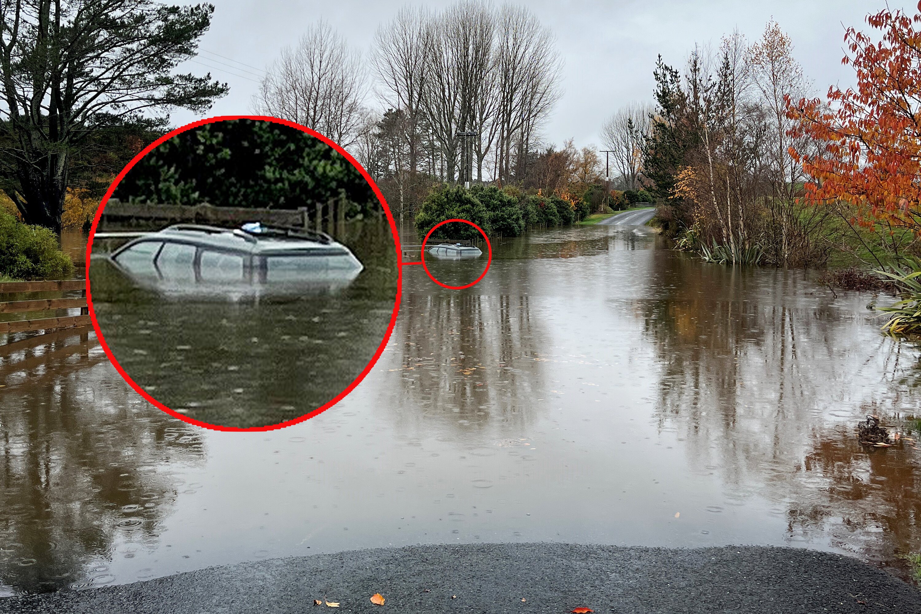 Police are praising the actions of two lines company workers who saved a motorist stuck in rising floodwaters south of Rotorua.