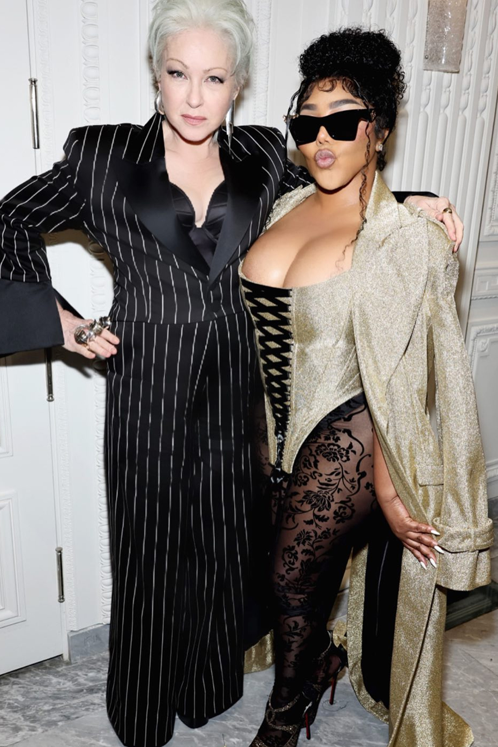 Cyndi Lauper and Lil' Kim attend the Christian Siriano show at New York Fashion Week. Photo / @csiriano