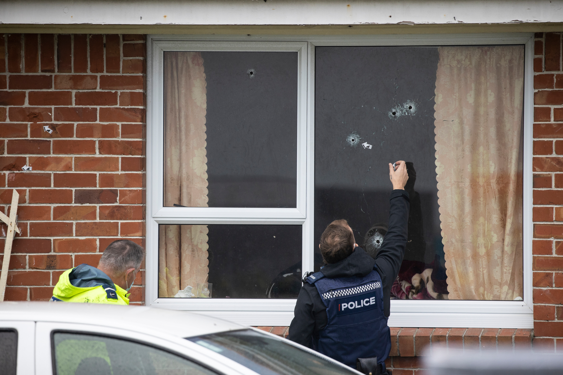 This house in Manukau was among at least 23 homes targeted in drive-by shootings in the space of a fortnight recently. Photo / George Heard