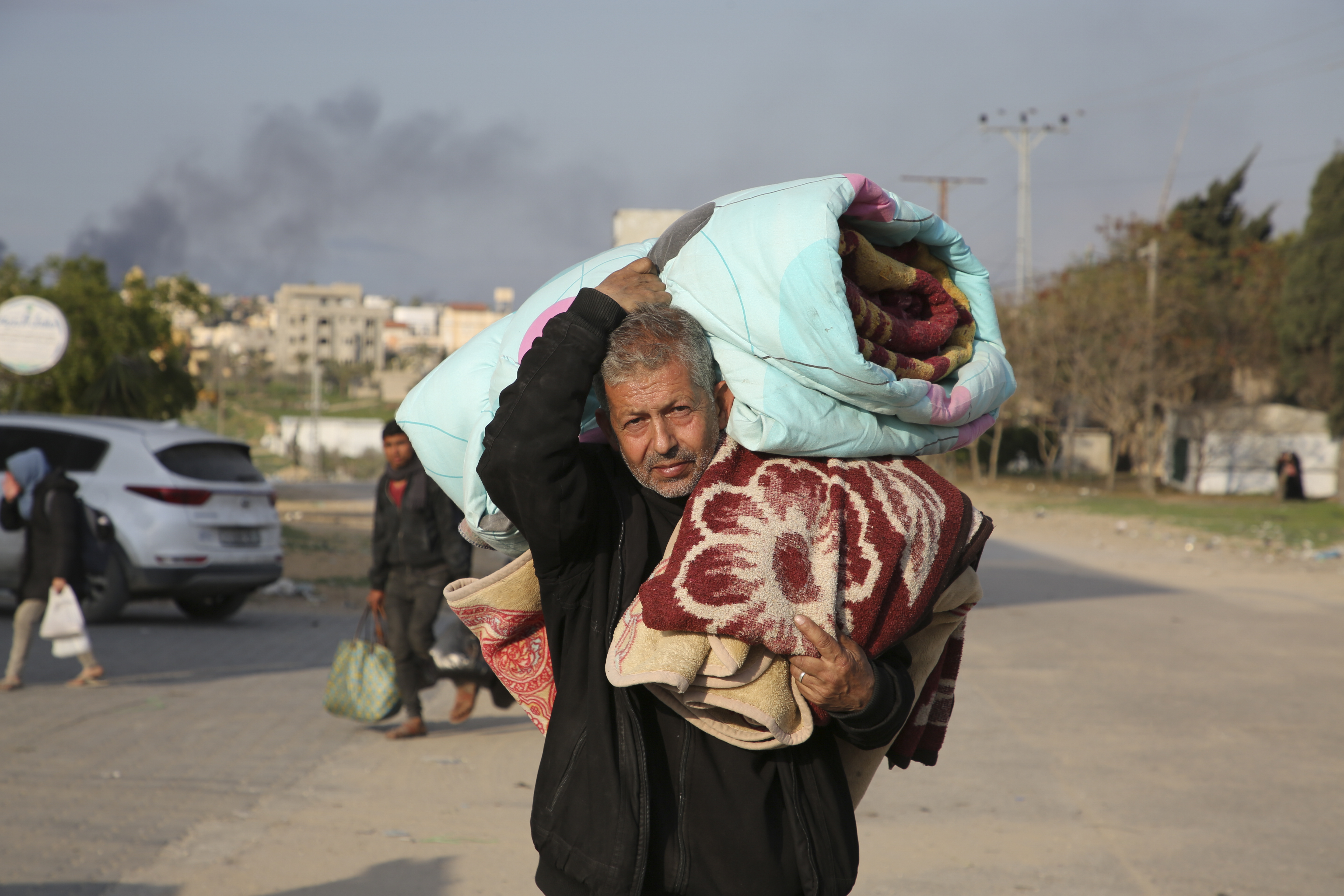 Palestinians fleeing the Israeli offensive on Khan Younis arrive at Rafah, Gaza Strip. Photo / AP