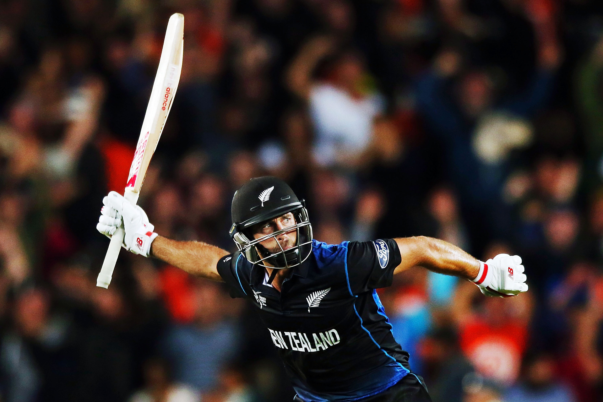 Grant Elliott celebrates after hitting a six to win the 2015 Cricket World Cup semifinal against his country of birth. Photo / Getty