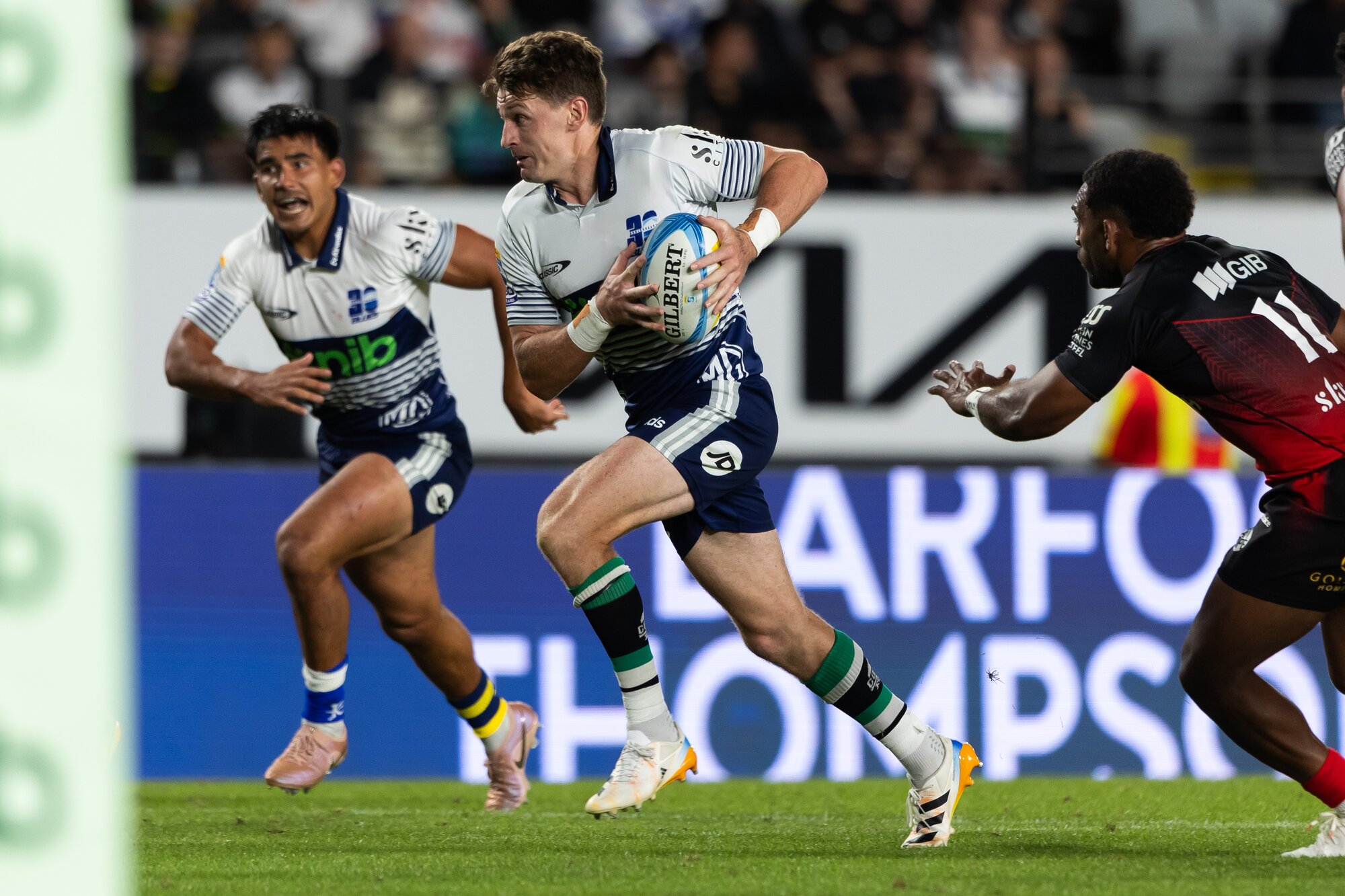 Beauden Barrett makes a break during the Blues clash with the Crusaders at Eden Park. Photo / Photosport