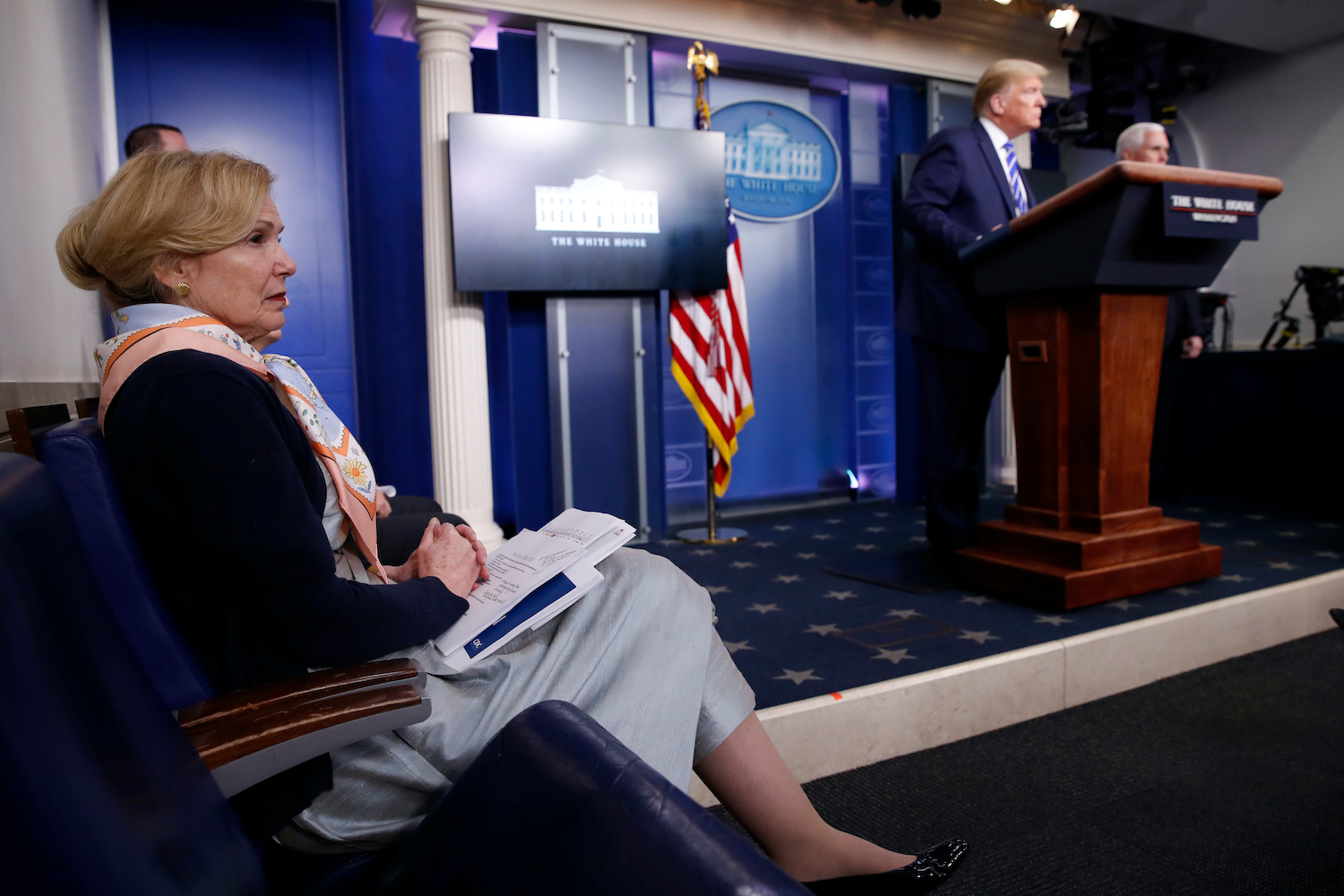 Dr. Deborah Birx, White House coronavirus response coordinator, listens as President Donald Trump speaks about the coronavirus. Photo / AP