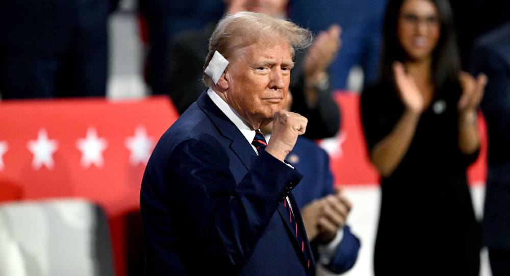 Trump sported a small tan ear bandage instead of the larger white one he wore during the Republican National Convention. Photo / Getty Images