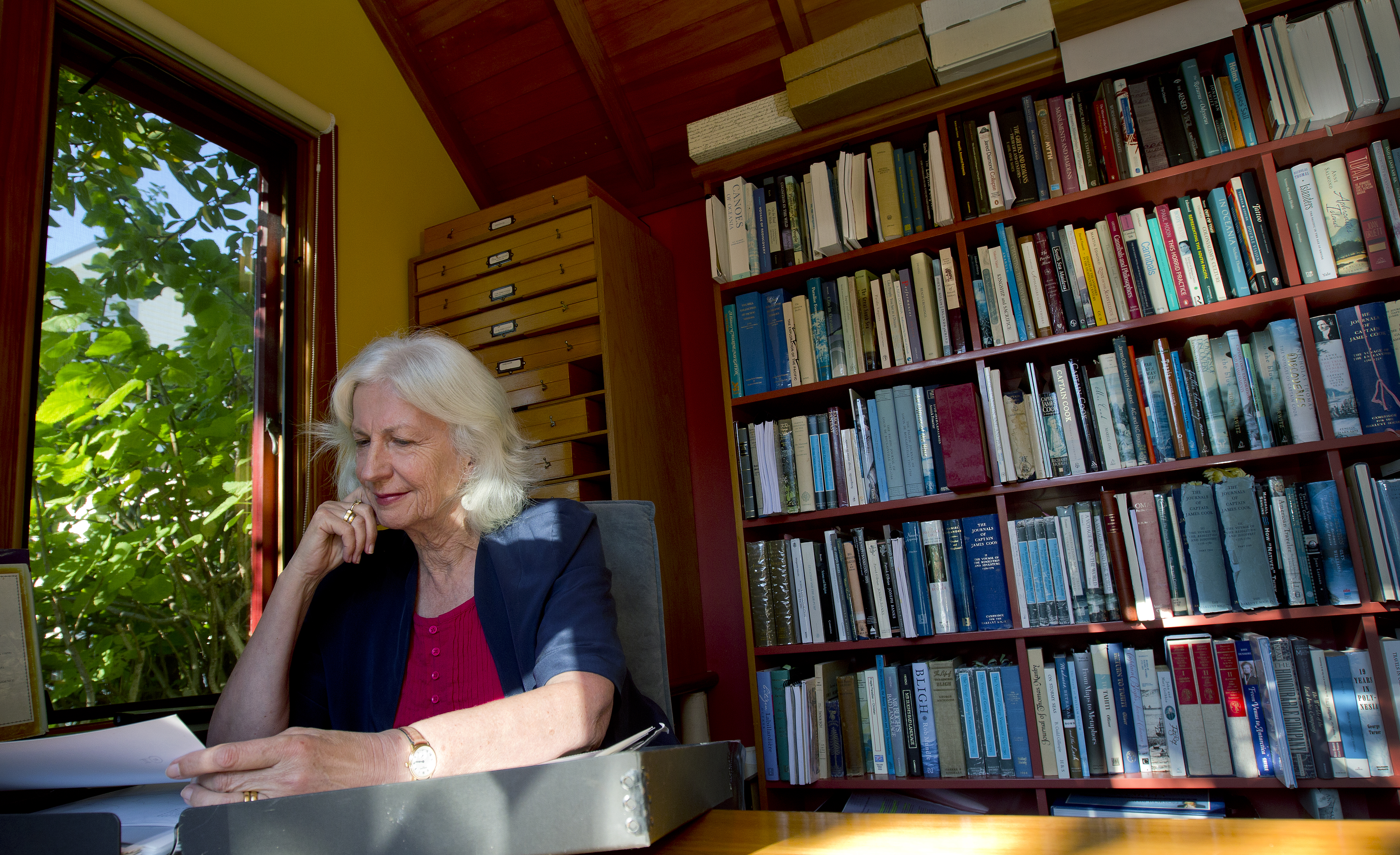 Anne Salmond, academic historian and author, pictured in the library of her Stanley Point home. Photo / Sarah Ivey