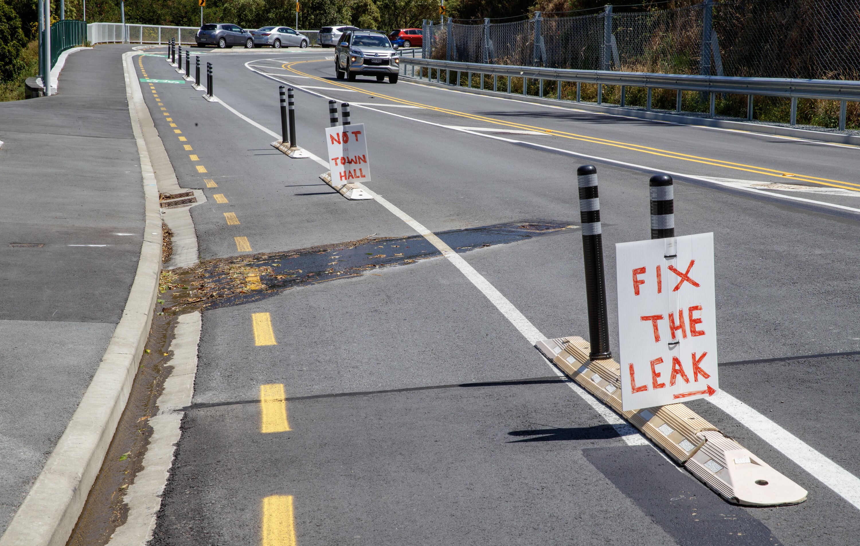 A message for Wellington City Council near a water leak on Ngaio Gorge Road, February 7, 2024. Photo / Mark Mitchell