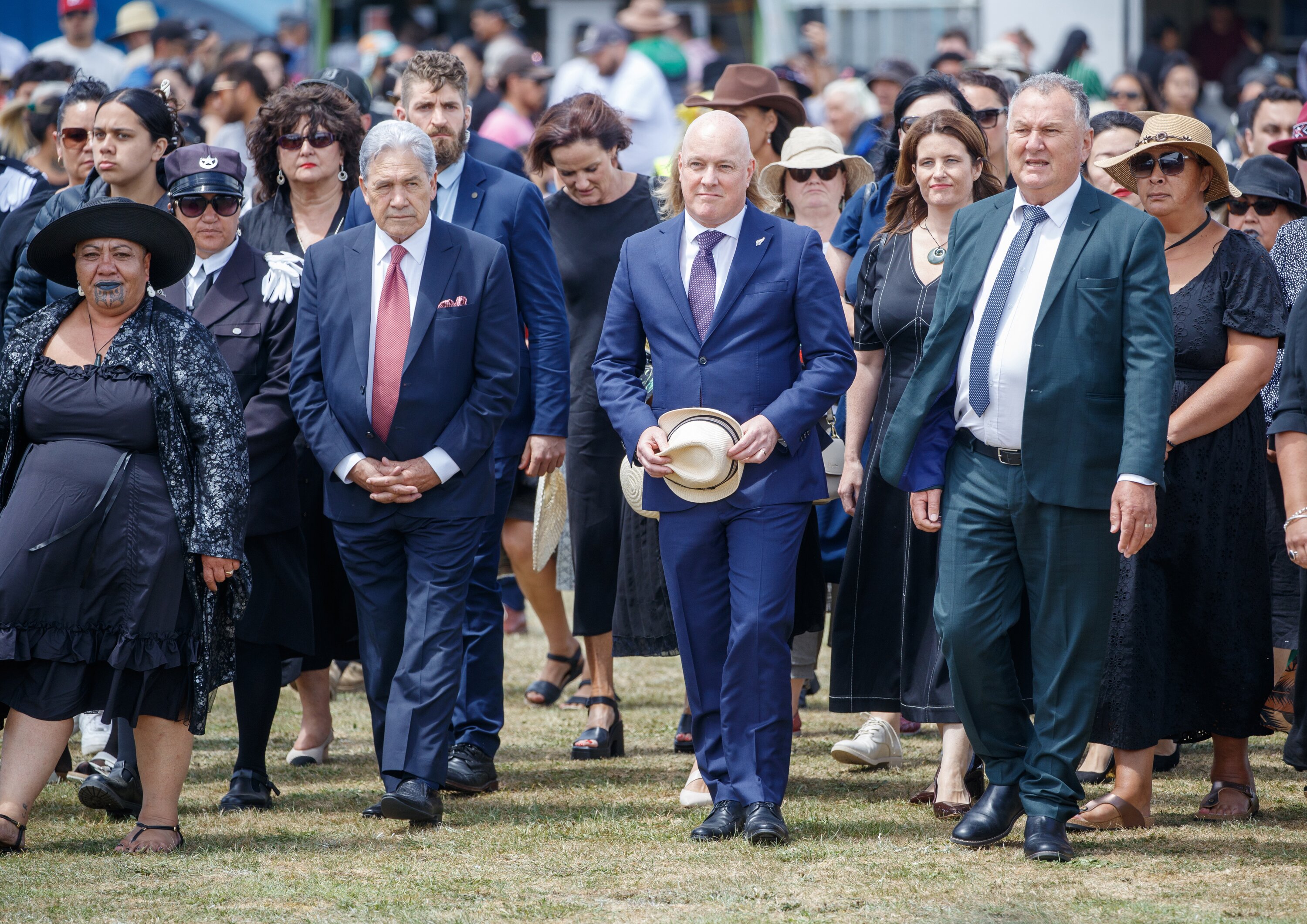 Prime Minister Christopher Luxon and Deputy Prime Minister Winston Peters lead the government delegation on to the marae at Rātana Pā. Photo / Mark Mitchell