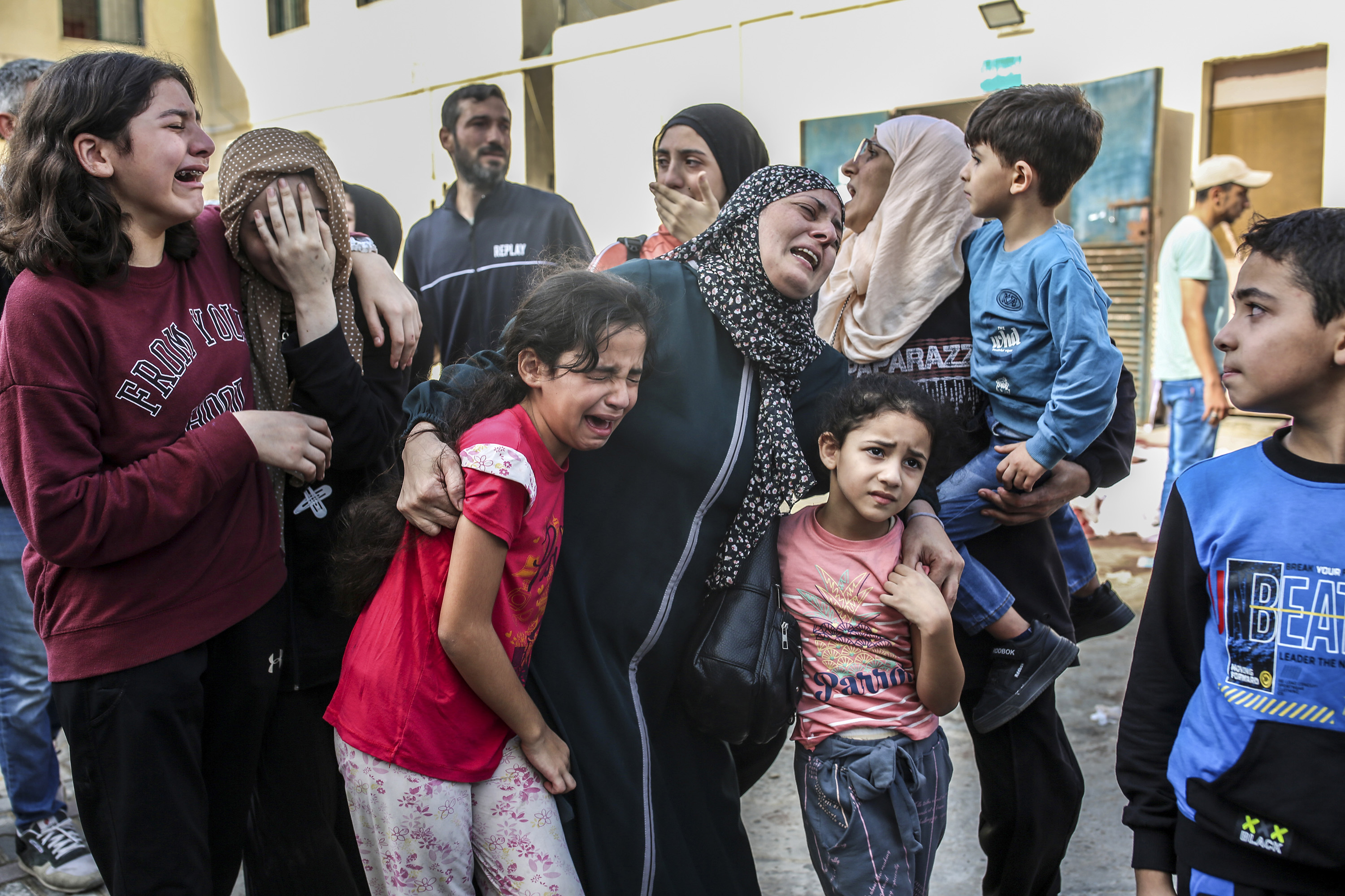 Family members mourn relatives killed in Israeli airstrikes on Nuseirat and Deir al-Balah in Gaza. Photo / Samar Abu Elouf, The New York Times