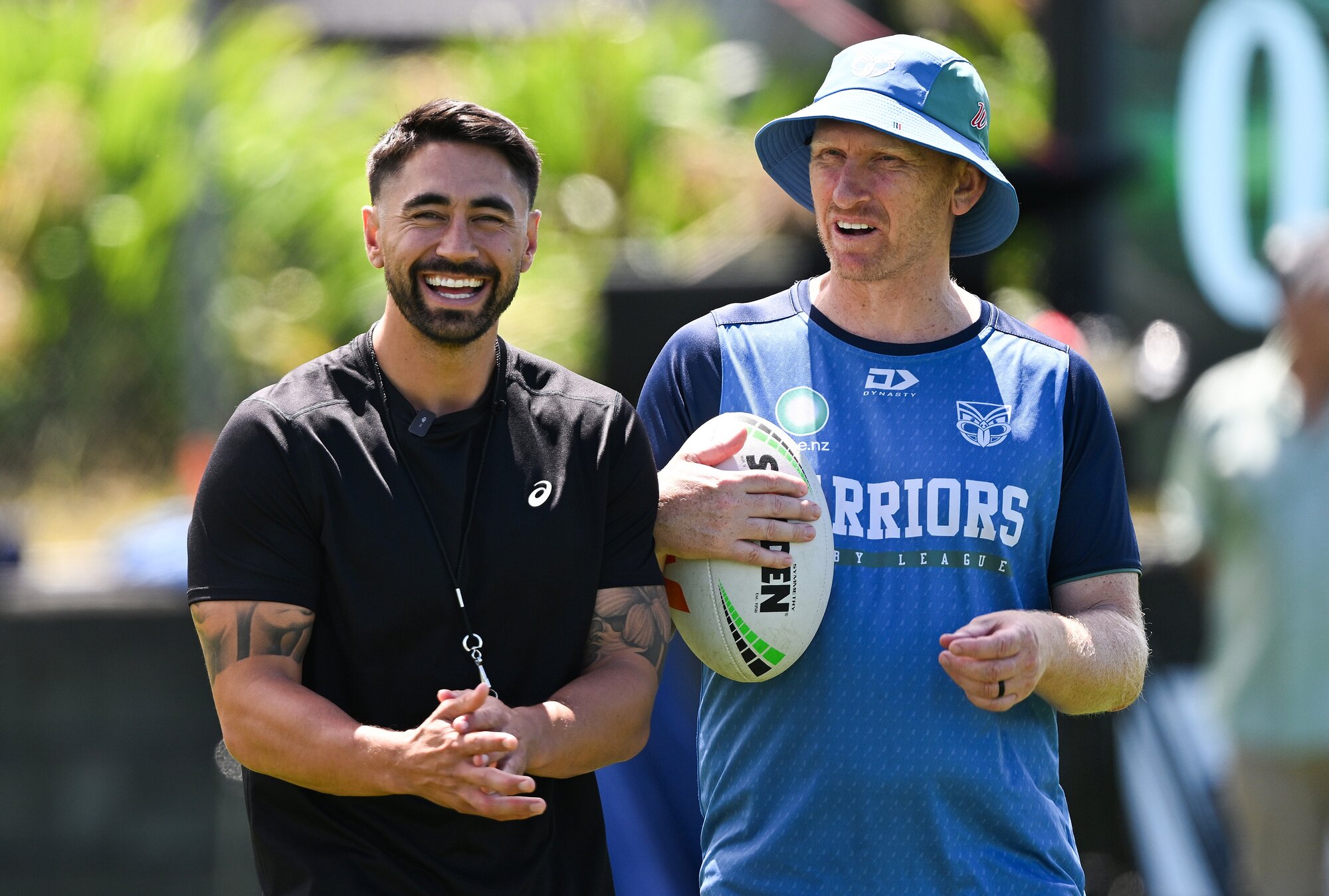 Warriors legend Shaun Johnson and head coach Andrew Webster. Photo / Photosport