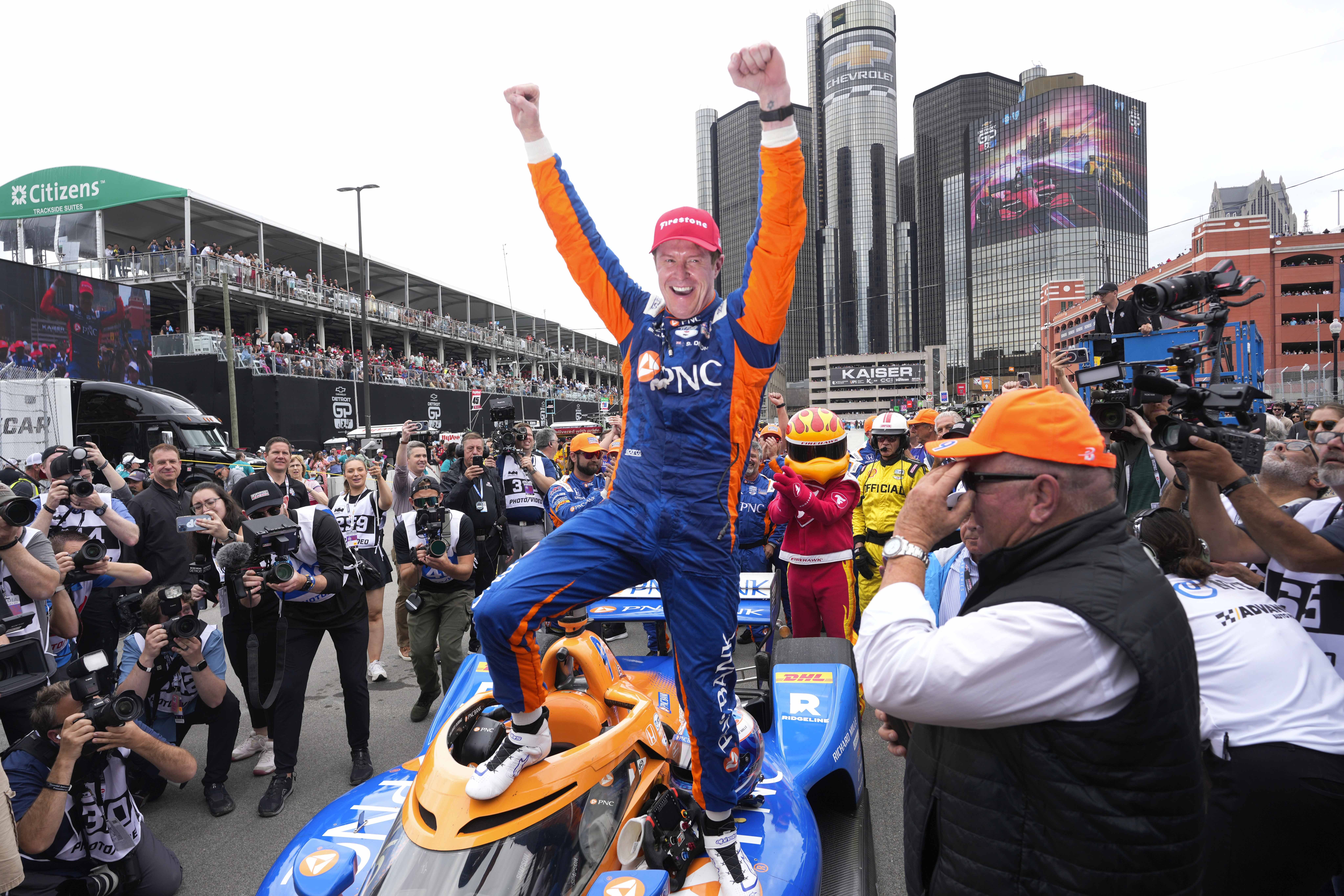 IndyCars great Scott Dixon celebrates winning the Detroit Grand Prix. Photo / AP