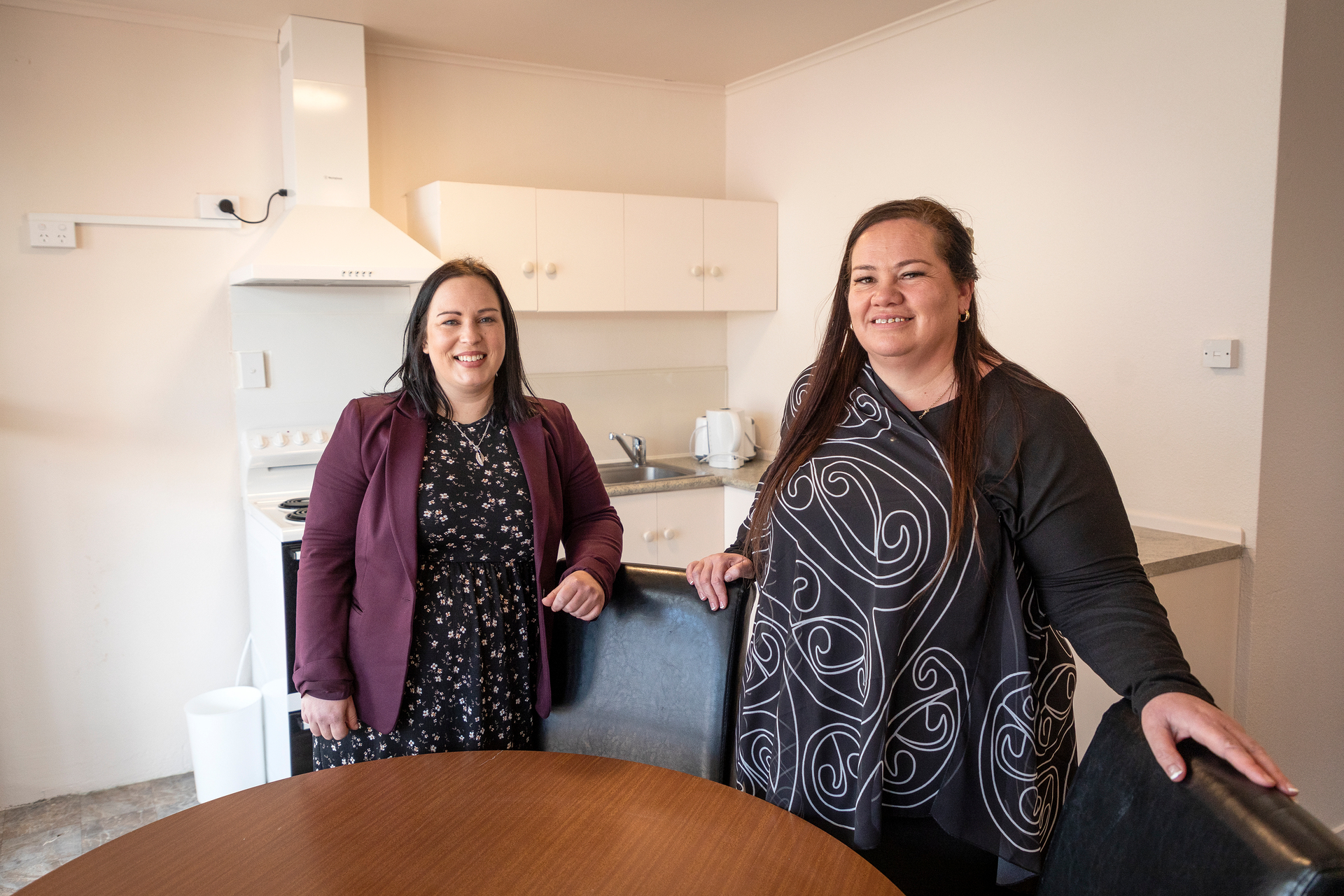Kāinga Ora supported housing director Karla Fisher (left) and Wera Aotearoa Charitable Trust housing operations manager Toli Maka inside one of the new properties. Photo / Andrew Warner