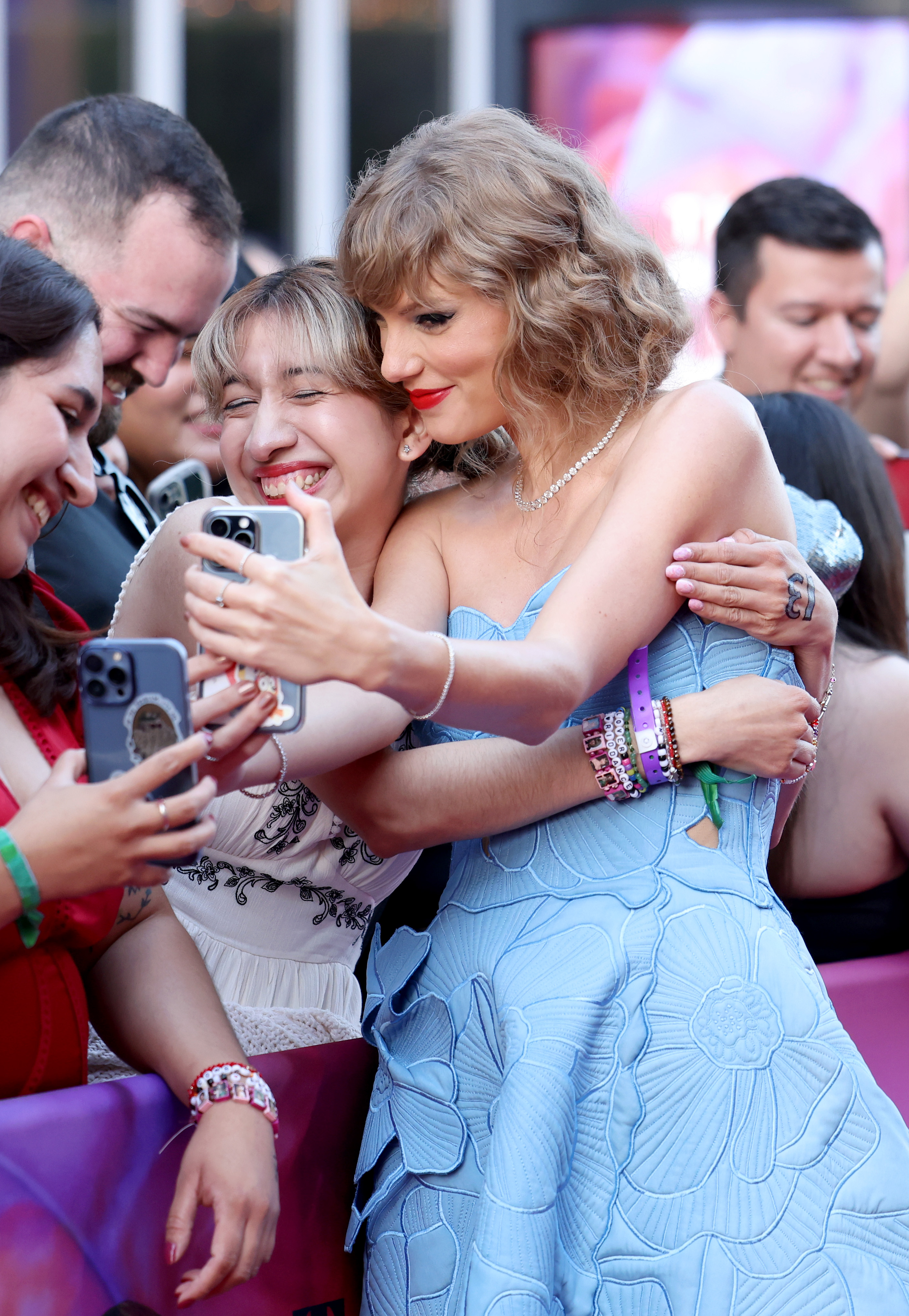 Up she rocked, blowing kisses and posing for selfies with her devoted fans, who promptly lost their collective minds. Photo / Getty Images