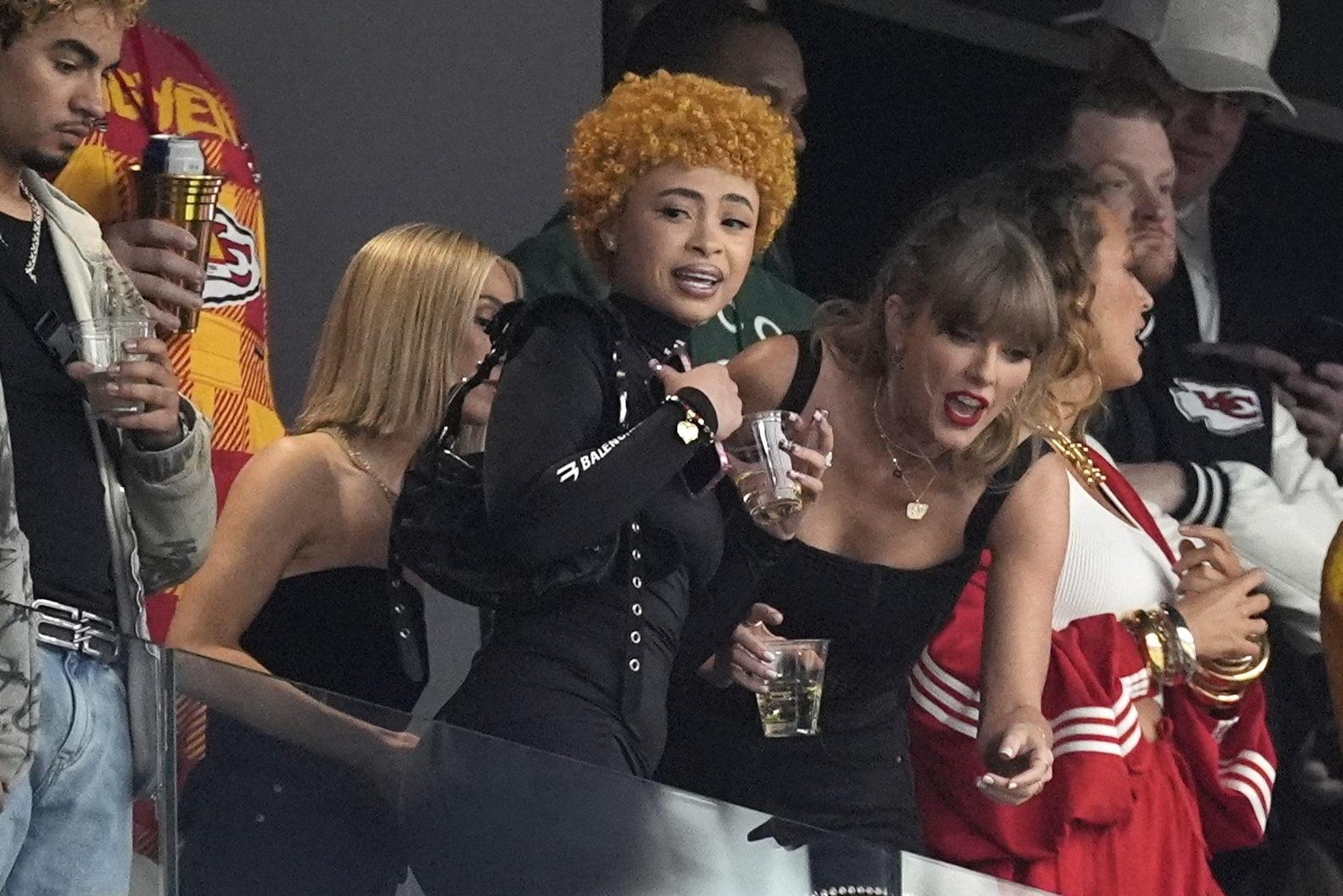 Ice Spice (left) and Taylor Swift talk before the NFL Super Bowl 58 football game. Photo /AP