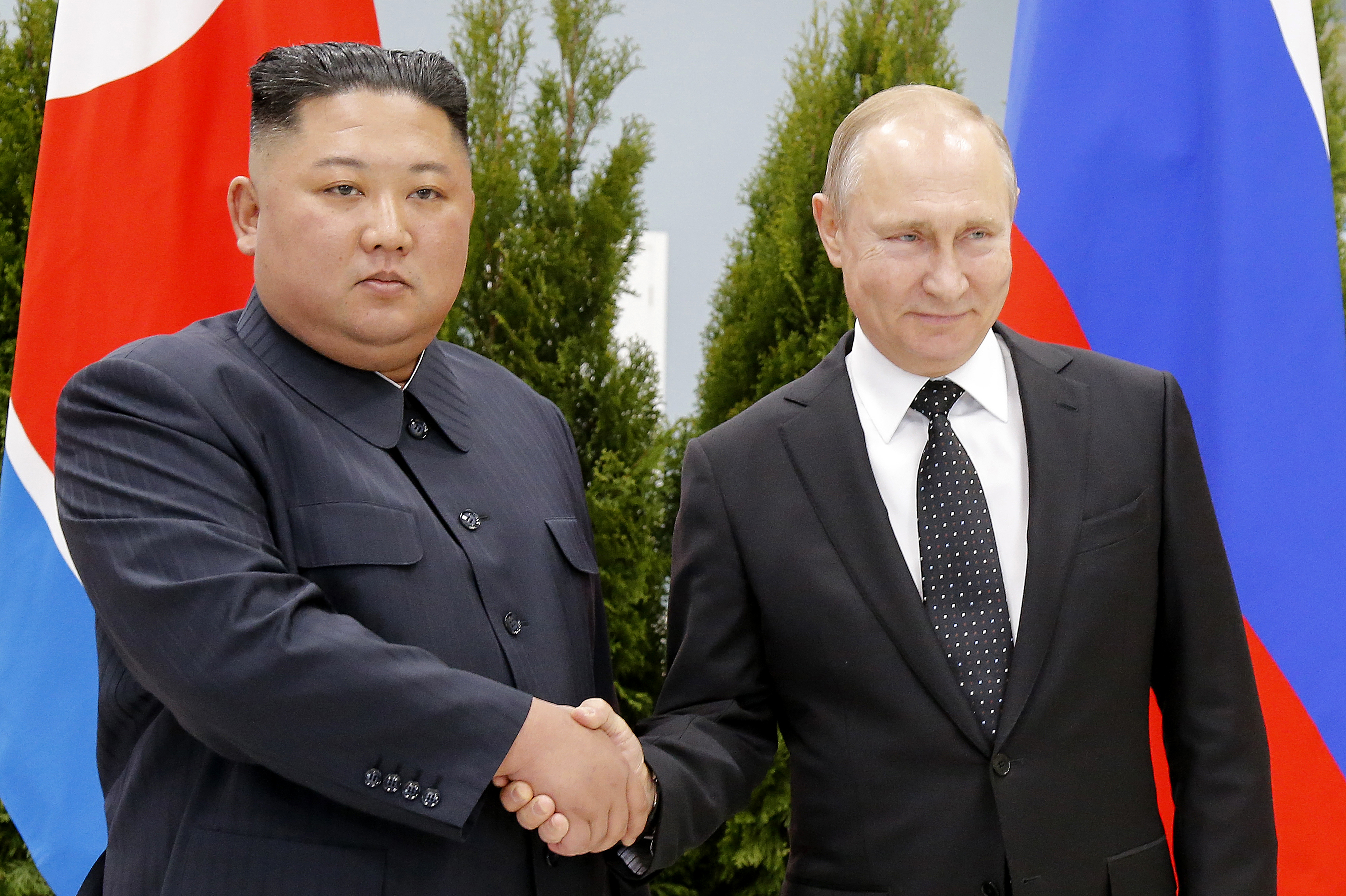 FILE - Russian President Vladimir Putin, right, and North Korea's leader Kim Jong Un shake hands during their meeting in Russia in 2019. Photo / AP