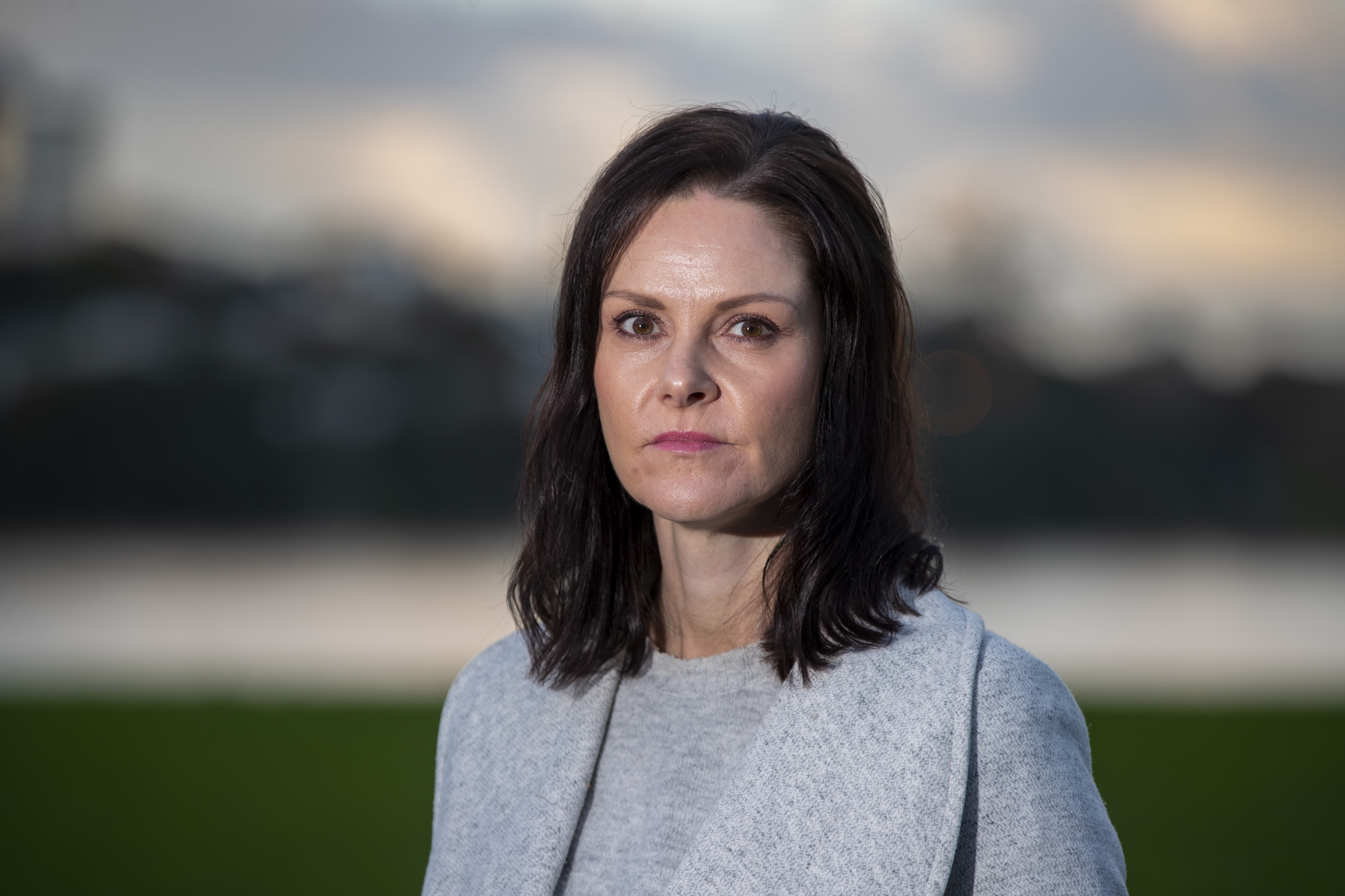 North Shore real estate agent Carla O'Neil lost $100,000 in a Citibank scam. She has been co-ordinating a victims group to advocate for change in the banking system. Photo / Michael Craig