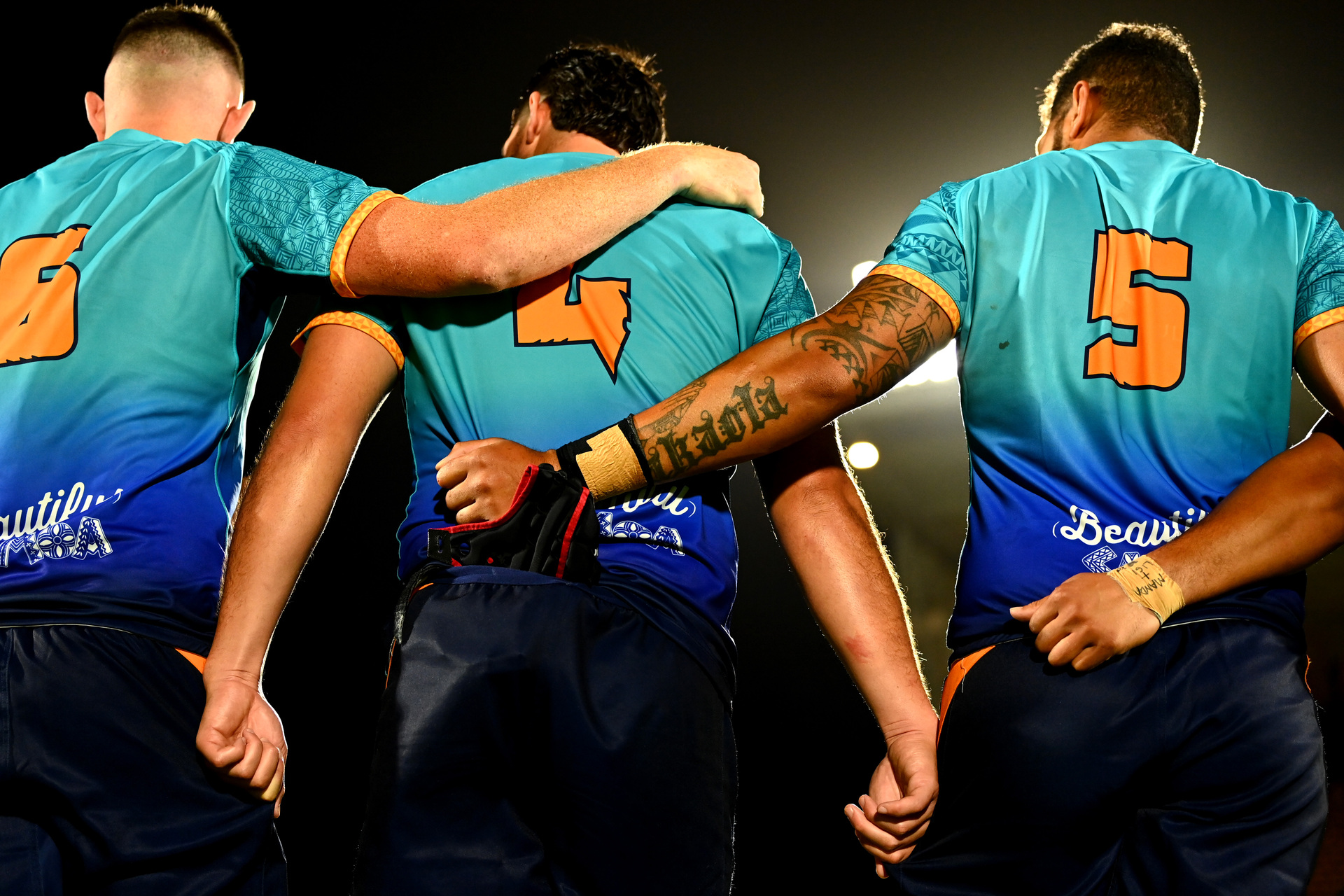 Felix Kalapu, Veikoso Poloniati and Alex McRobbie of Moana Pasifika huddle during the Super Rugby pre season trial match between Moana Pasifika and the Chiefs. Photo / Photosport.co.nz