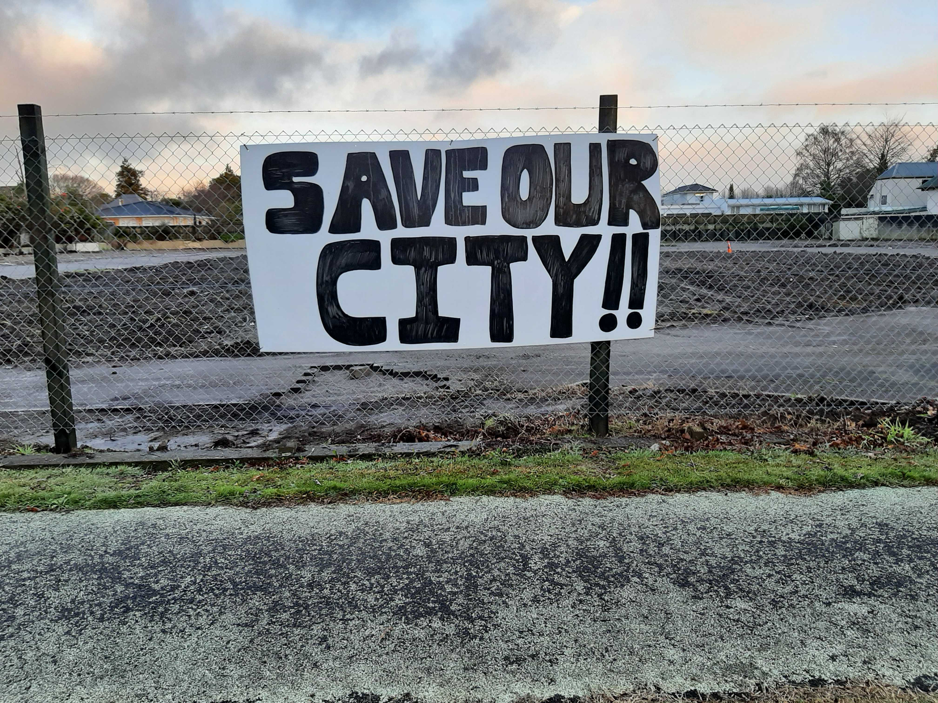 Protest signs appeared on vacant land near Wylie Court this month. Photo / File 