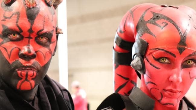 This couple is planning a Star Wars themed wedding.
