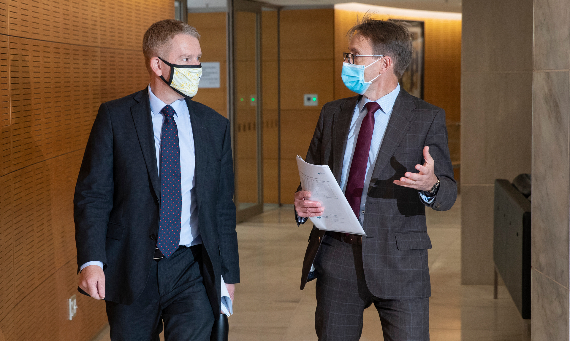 Covid-19 Response Minister Chris Hipkins (left) and director-general of health Dr Ashley Bloomfield arriving for their update at Parliament today. Photo / Mark Mitchell