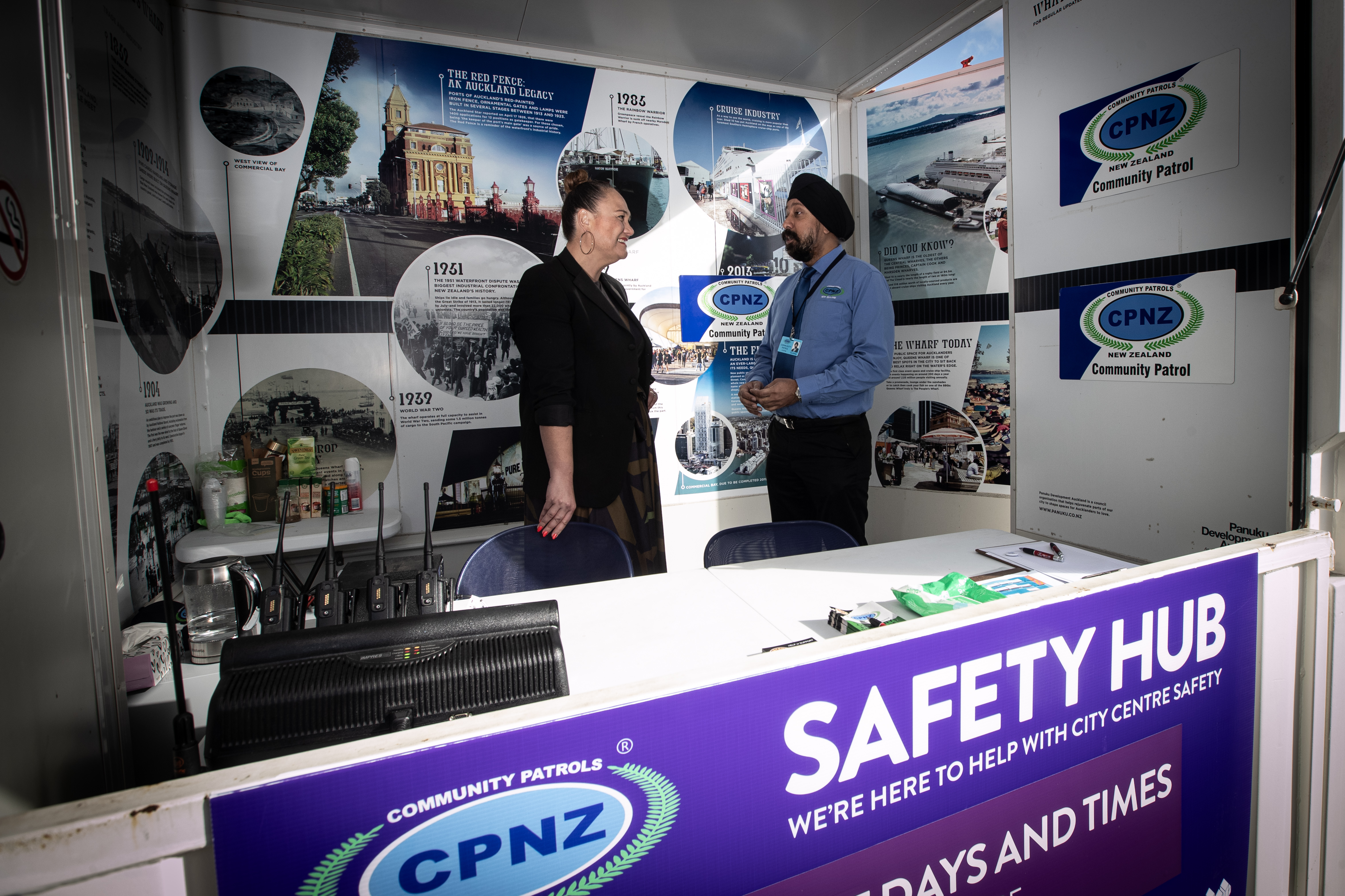 Minister for Auckland Carmel Sepuloni speaks with Gurdeep Talwar from Community Patrols of New Zealand, within the currently established hub. Photo / Jason Oxenham.