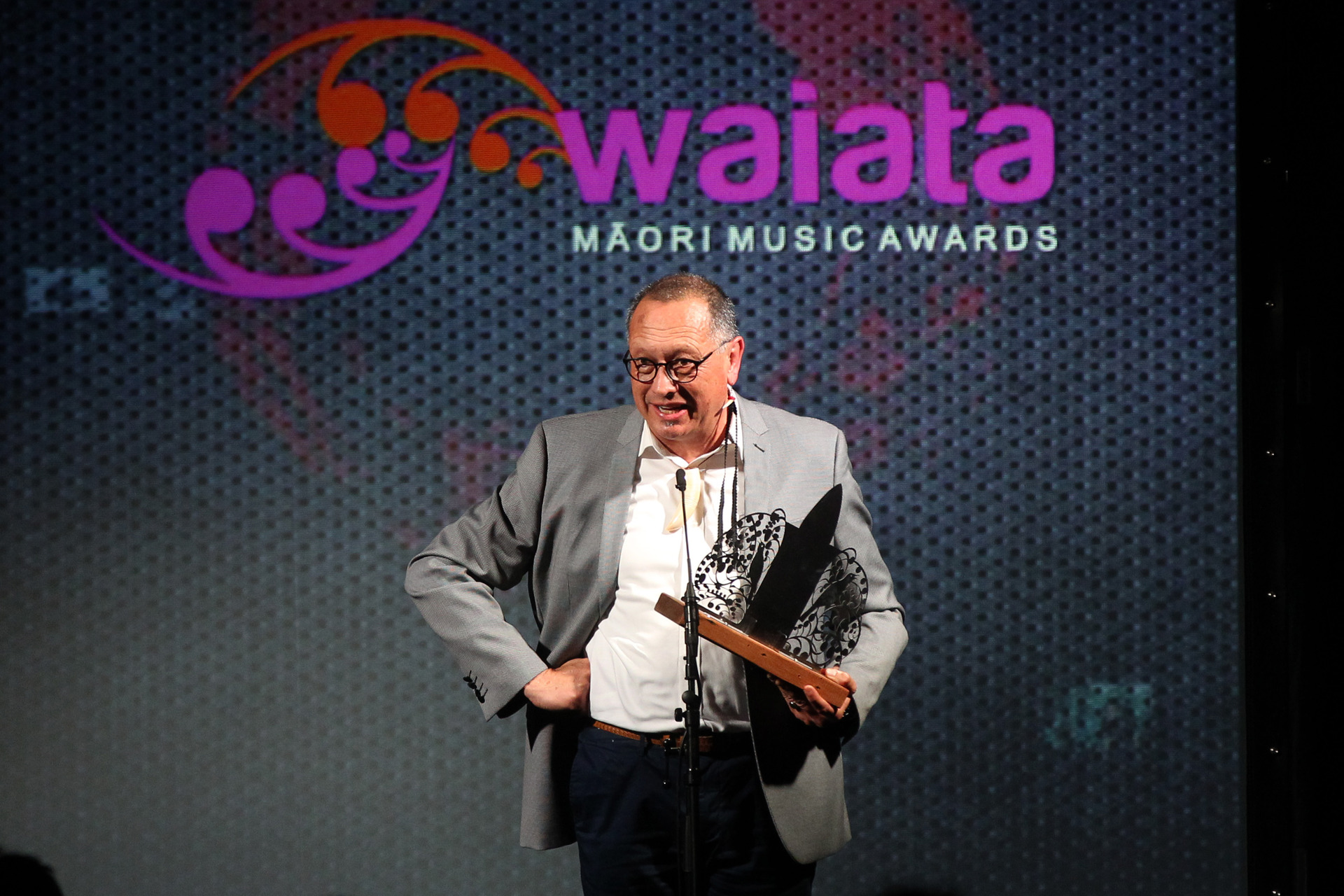It's important to celebrate success, Derek Lardelli says. He's pictured receiving the Te Tohu Kaitiaki Tikanga Puoru, at Waiata Māori Music Awards in 2018. File photo / Duncan Brown 