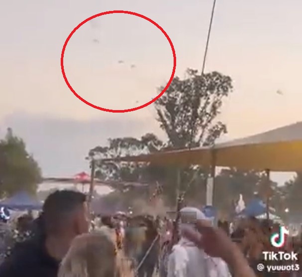 Parachuting Hamas Militants launched an attack at the Shankra Festival in Gaza. Image / Screenshot