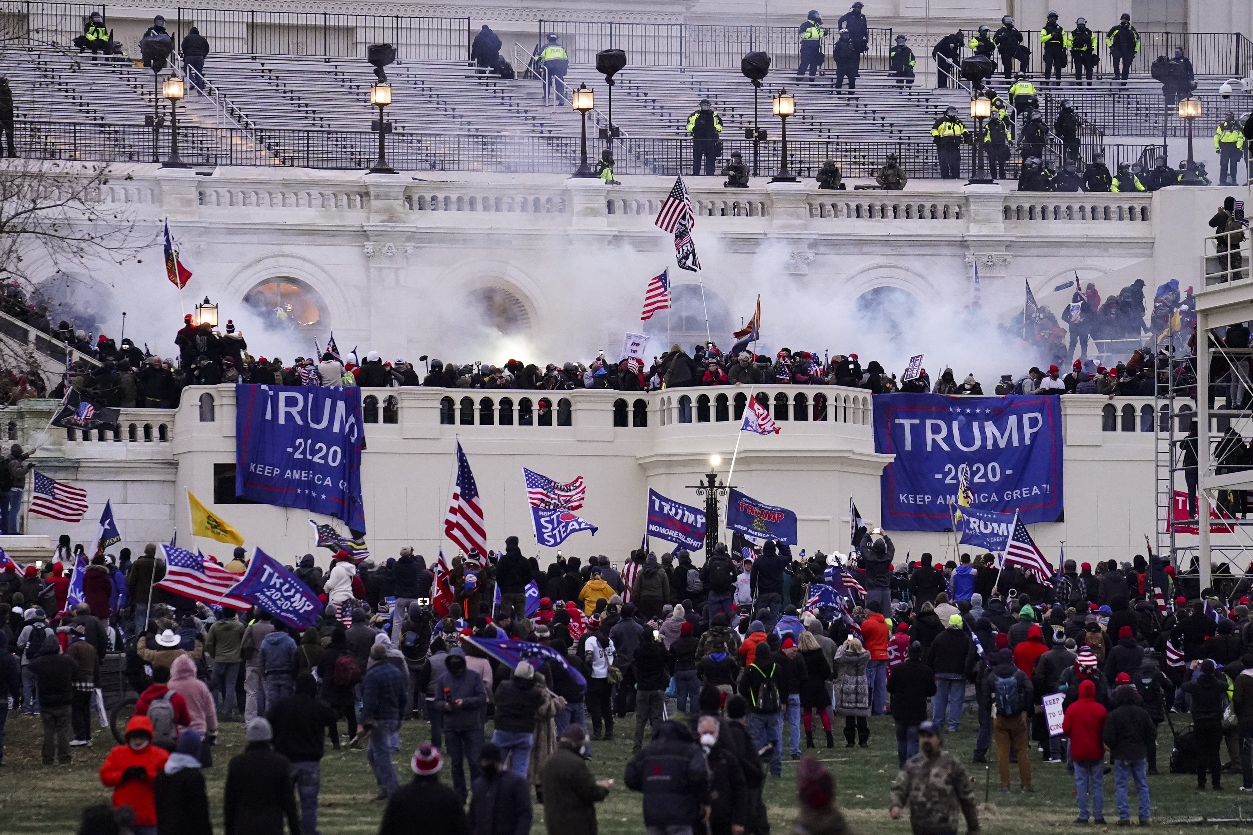 Insurrectionists loyal to President Donald Trump storming the Capitol. Photo / John Minchillo, AP, File