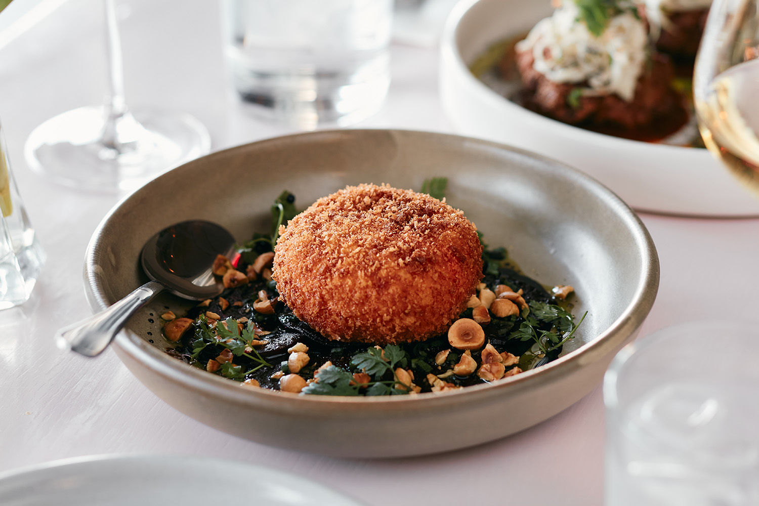 The beetroot carpaccio with a deep-fried ball of goat’s cheese. Photo / Babiche Martens