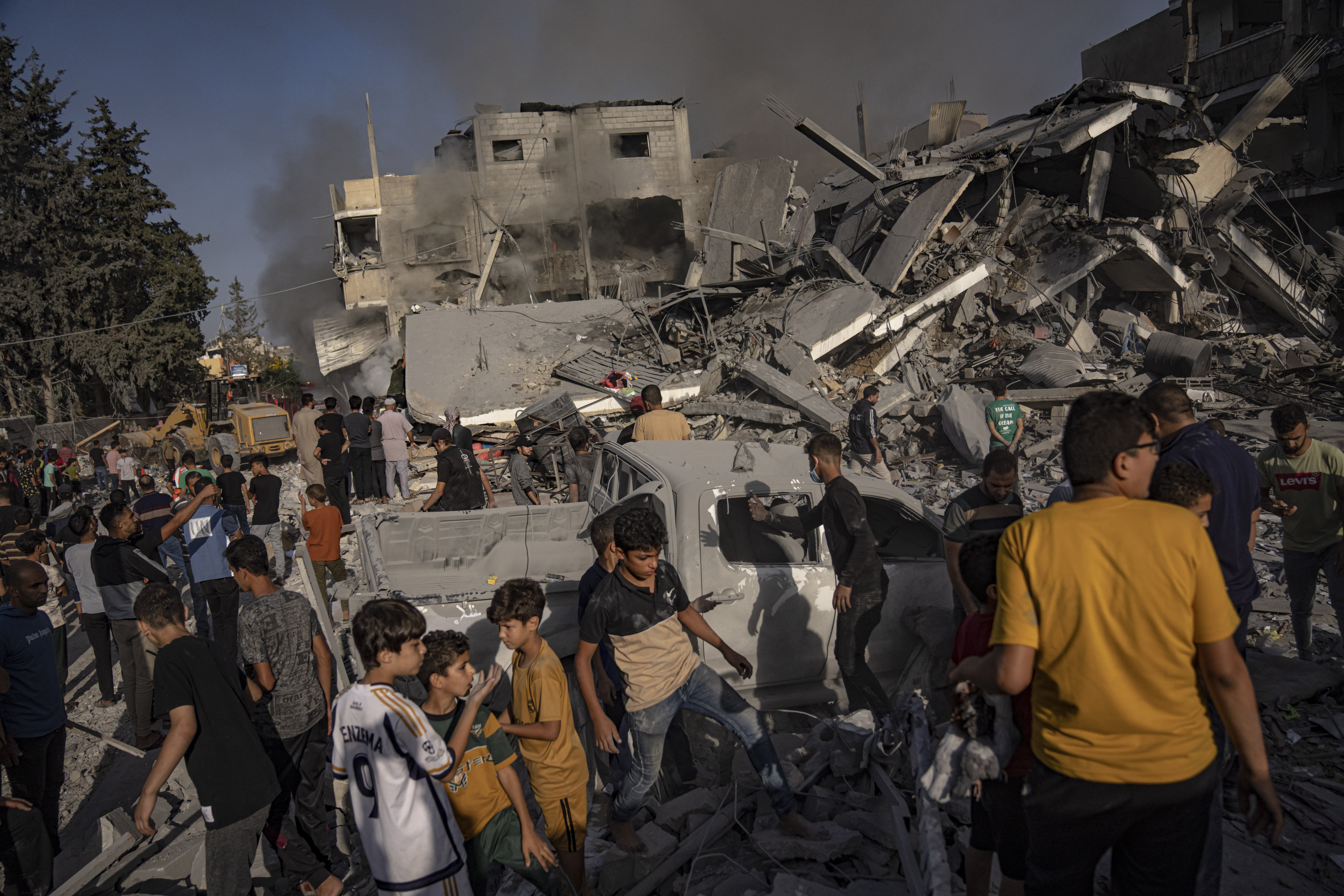 Palestinians look for survivors following an Israeli airstrike in Khan Younis refugee camp, southern Gaza Strip, on Tuesday, November 7. Photo / AP  