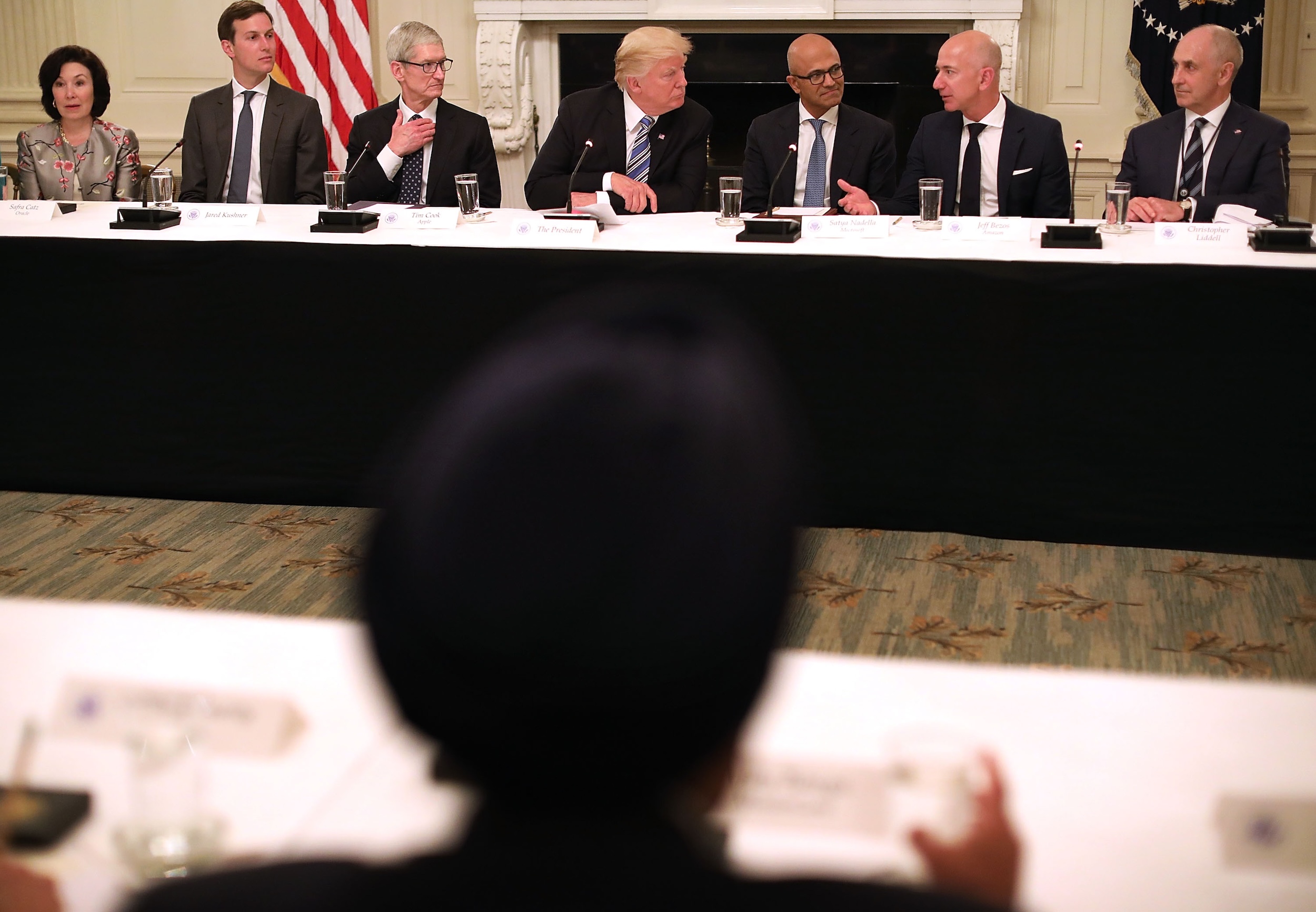 Chris Liddell (far right) at a 2017 Technology Council Roundtable with Donald Trump and members of the President's American Technology Council, including Apple CEO Tim Cook, Microsoft CEO Satya Nadella and Amazon founder Jeff Bezos. Photo / Getty