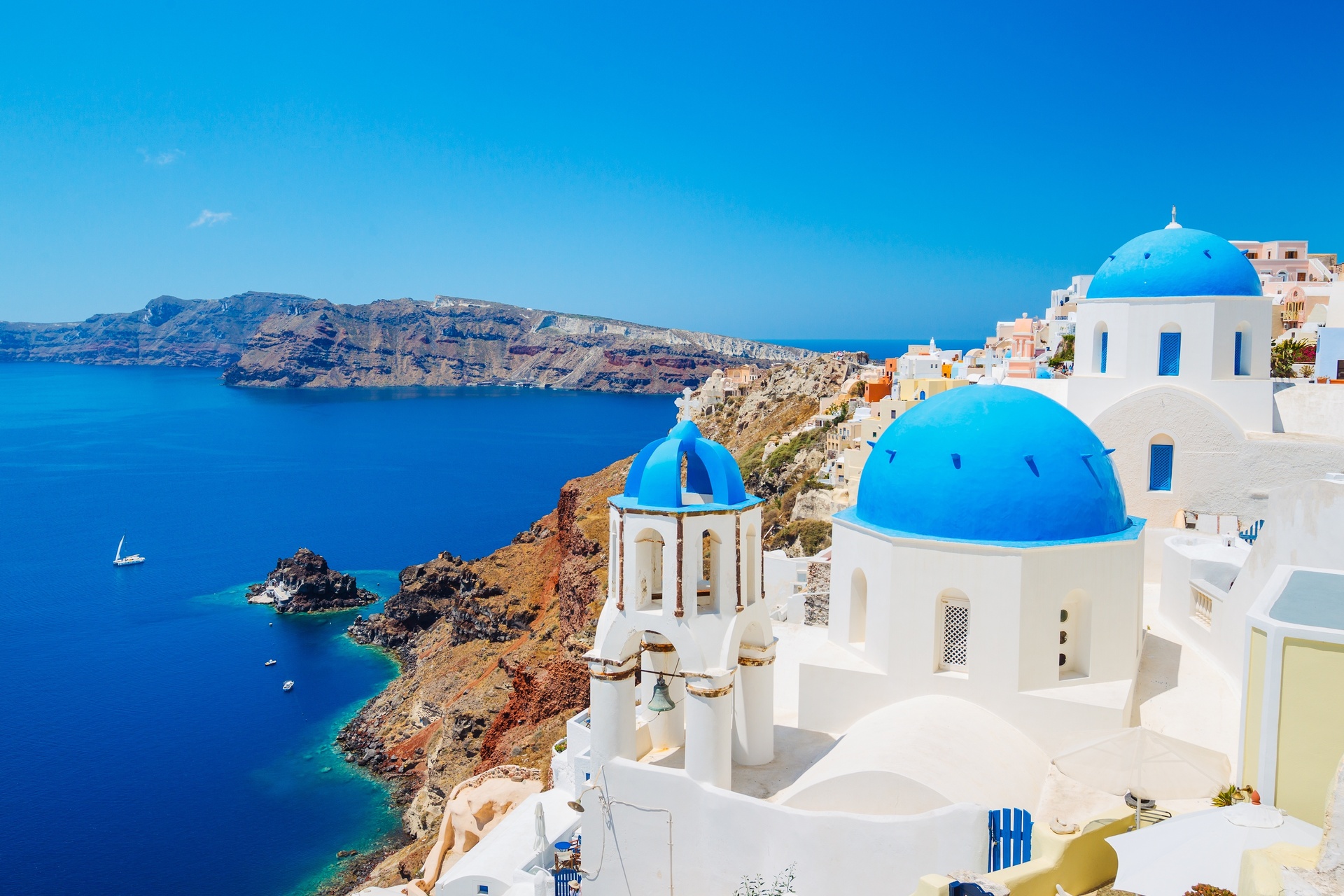 Santorini island, Greece, beautiful view of blue ocean and traditional dome church architecture. Photo / 123rf