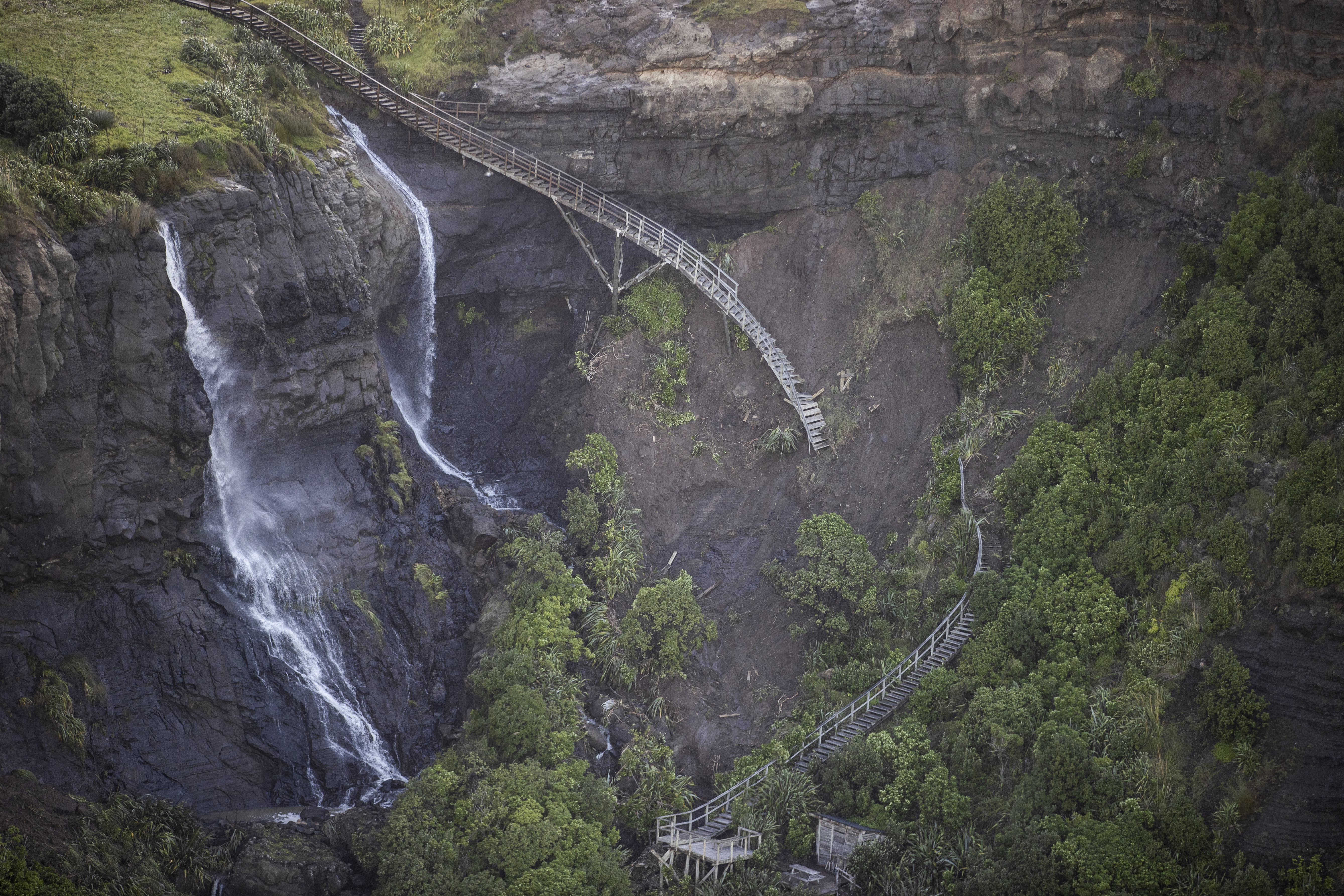 Damage at Muriwai on February 13, the day Cyclone Gabrielle struck. Photo / George Heard