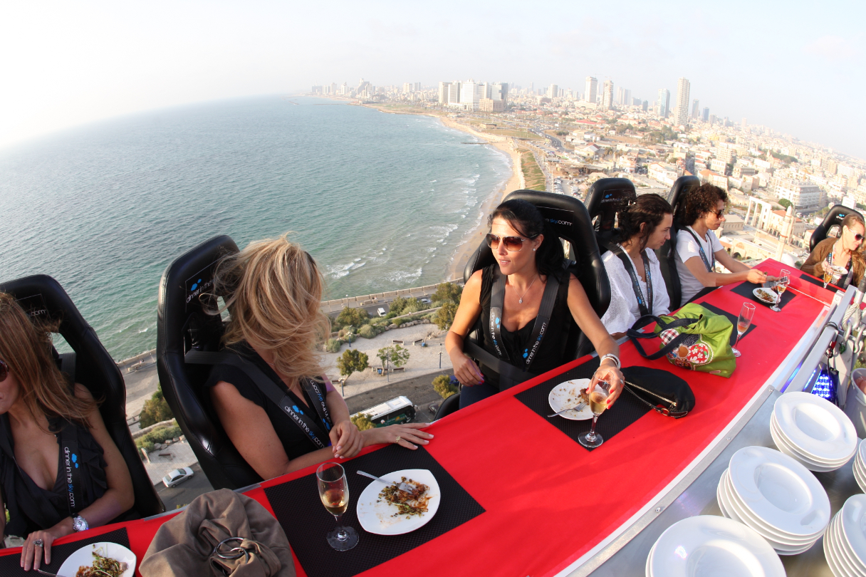 Perched up in the sky with the coastal views of Jaffa. Photo / Dinner in the Sky