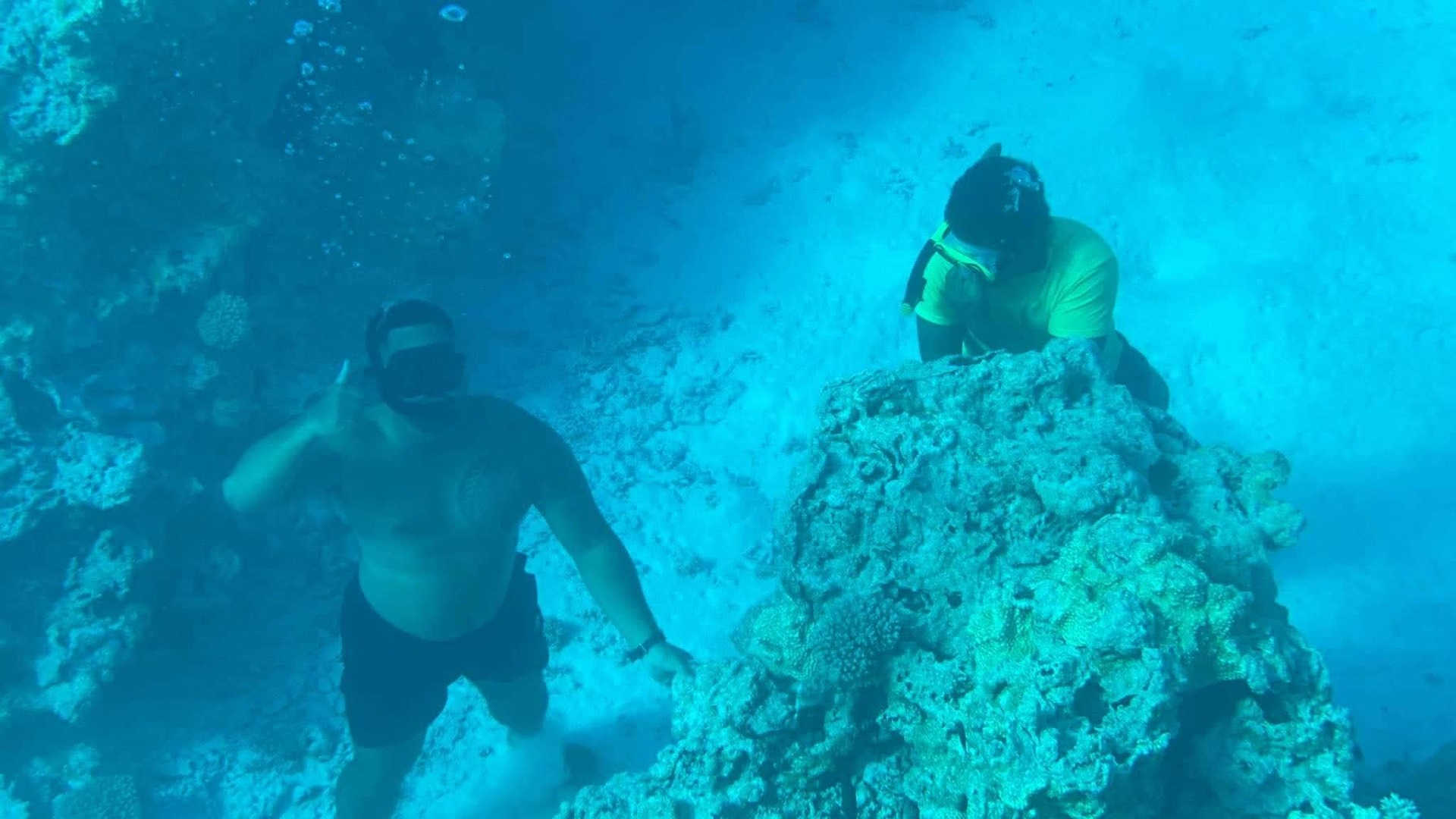Peki Lepaio's husband, Poni, pictured in the waters around their home. Photo / Supplied