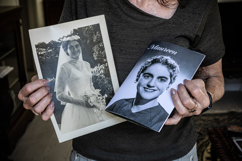 Alex Jackson-Forrester holds up photos of her mother, Maureen Forrester, in her younger days. Photo / Jason Dorday