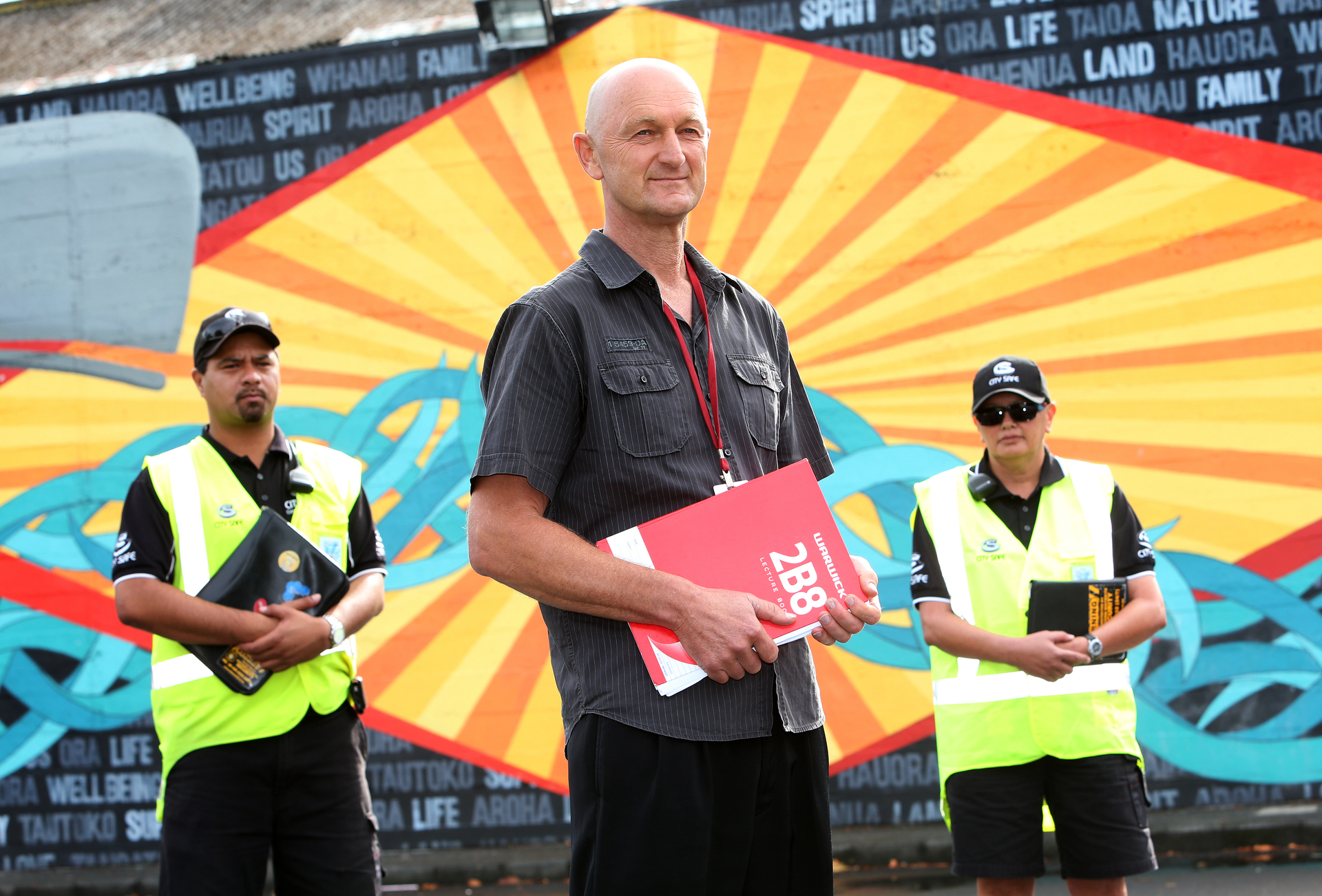 Dave Palmer with two City Safe officers. Photo / Michael Cunningham