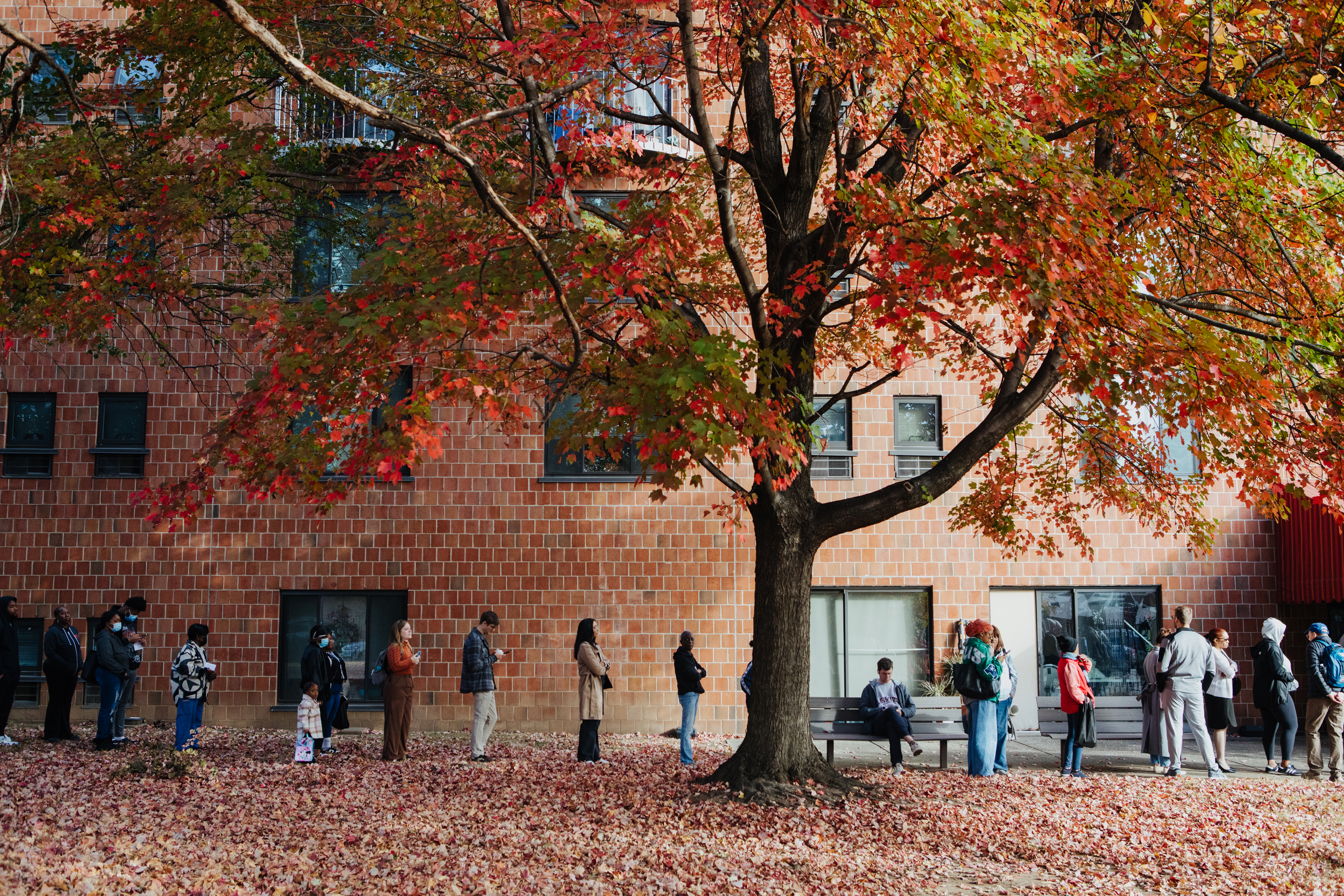 Voters wait in line to enter a polling place in Philadelphia on Election Day. Photo / Michelle Gustafson, The New York Times