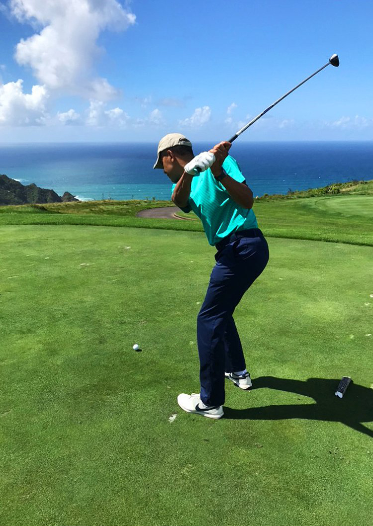 Former President Barack Obama tees off at the Kauri Cliffs golf Course. Photo / Supplied