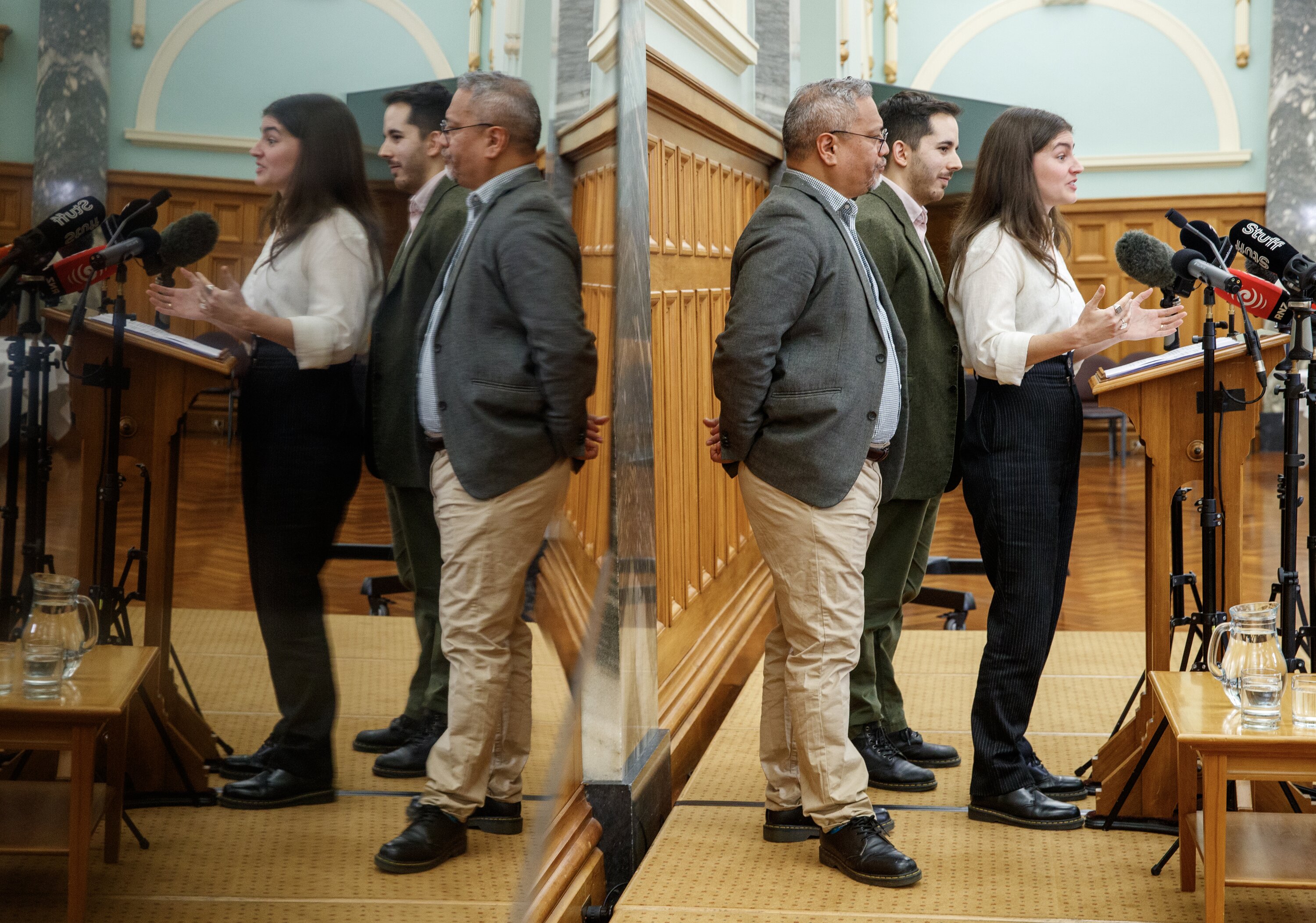 Green Party co-leader Chlöe Swarbrick, with colleagues Teanau Tuiono and Ricardo Menendez March, announcing the Party has asked MP Darleen Tana to resign. Photo / Mark Mitchell   