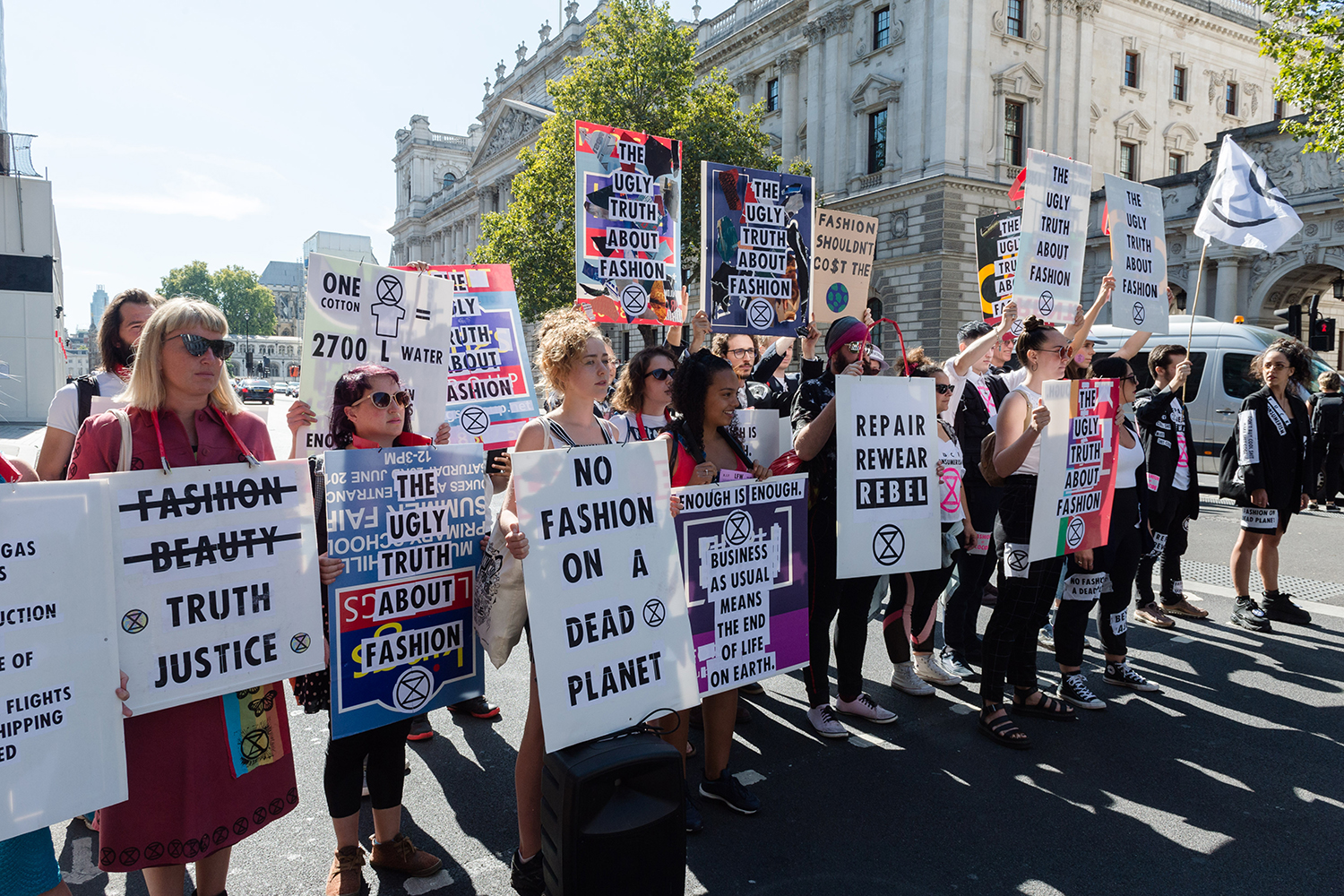 Extinction Rebellion activists at London Fashion Week in September, calling for the British Fashion Council to cancel London Fashion Week until it can be sustainable. Photo / Getty Images