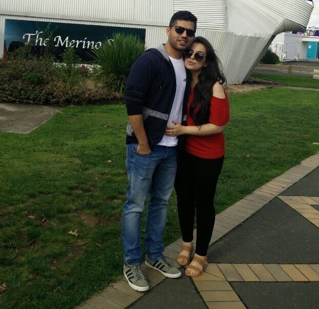 Karan Gosain (left) and his wife say they sold their home for below market value because buyers were put off by their antisocial neighbours. Photo / Supplied  
