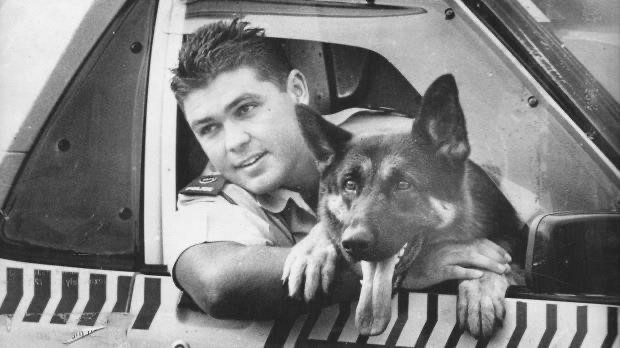 Constable Mark Mitchell with his police dog Czar. Photo / Supplied