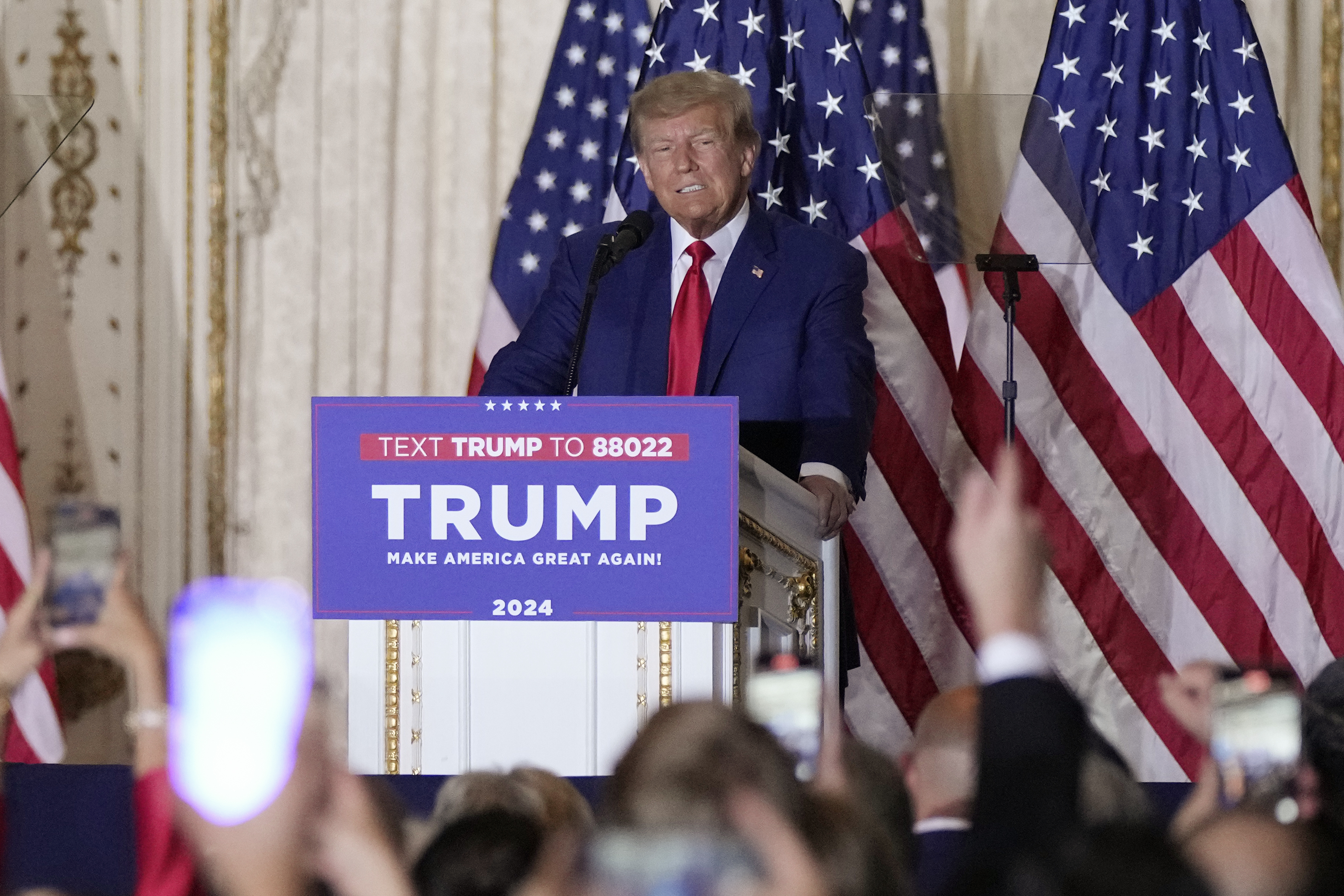 Former US President Donald Trump speaks at his Mar-a-Lago estate hours after being arraigned in New York City. Photo / AP