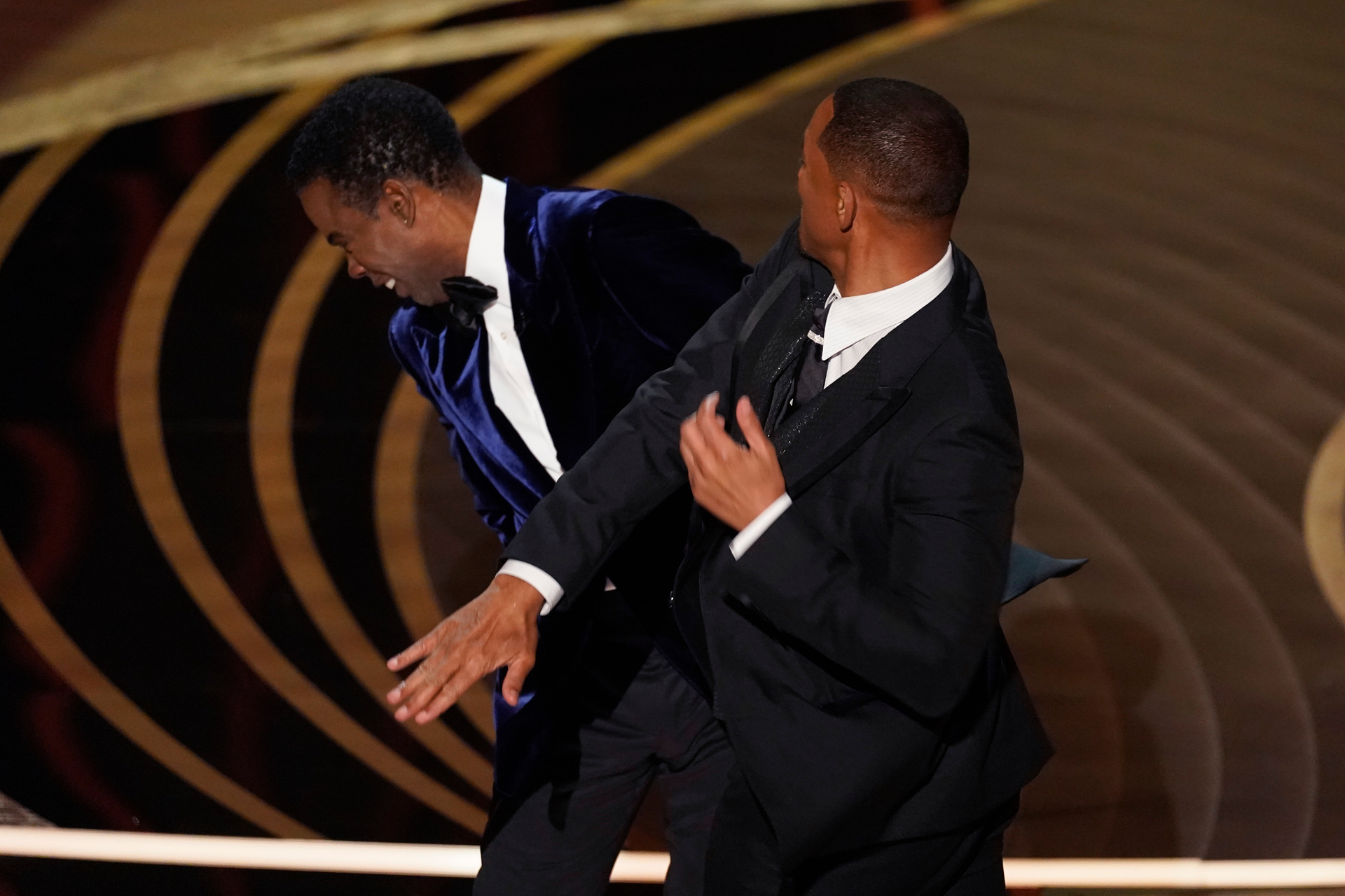 Will Smith delivers the slap - or was it a punch? - heard around the world, at yesterday's Oscars. Photo / AP