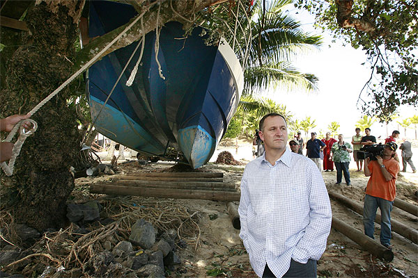 Sir John Key views damage at Samoa's Sinalei Resort, which was owned by New Zealanders Joe and Tui Annandale. Tui was killed in the 2009 tsunami. Photo / Brett Phibbs
