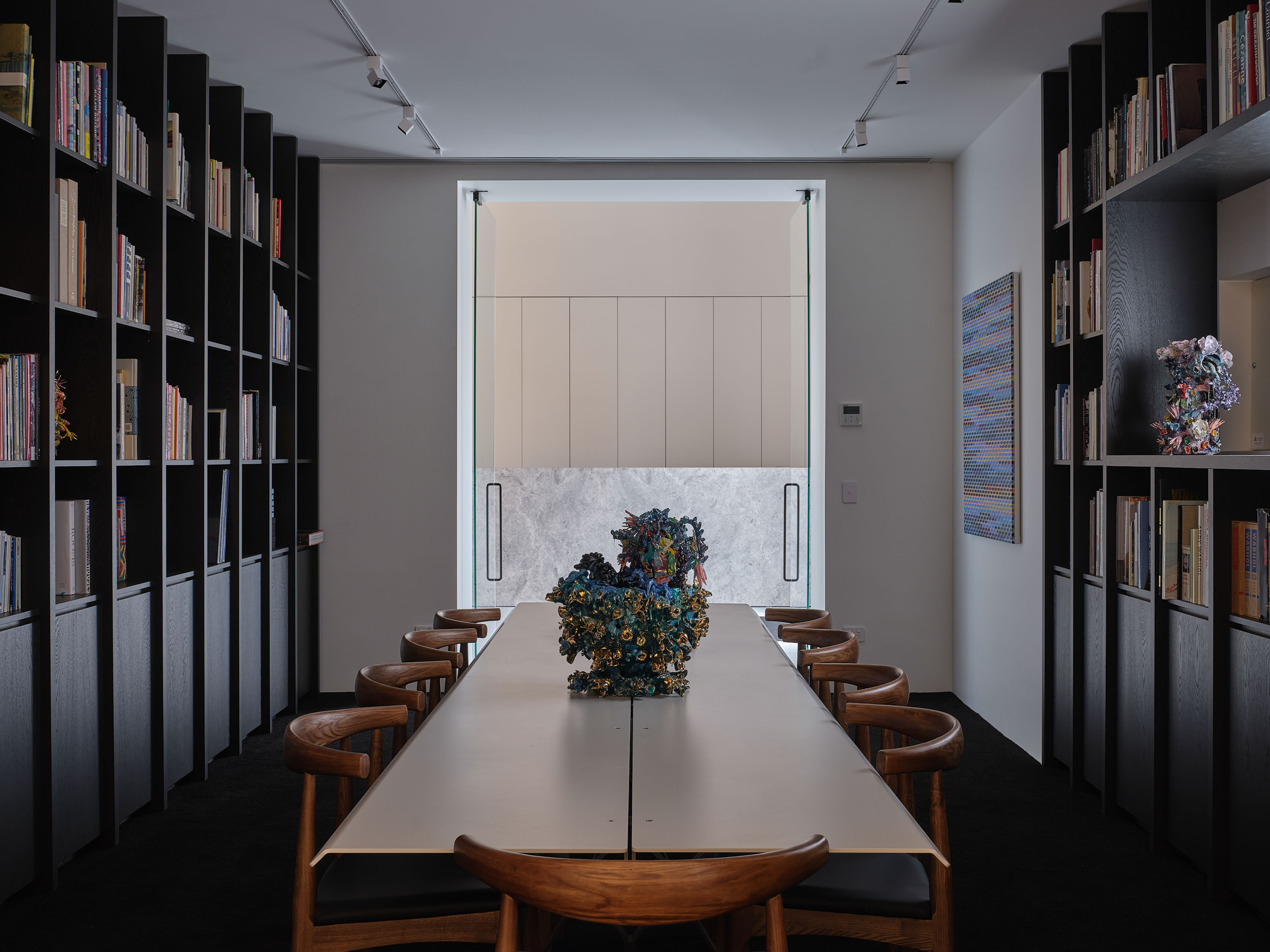 The arts library at Gow Langsford Onehunga is a snug, dark counterpart to the bright white gallery spaces. Photo / Sam Hartnett