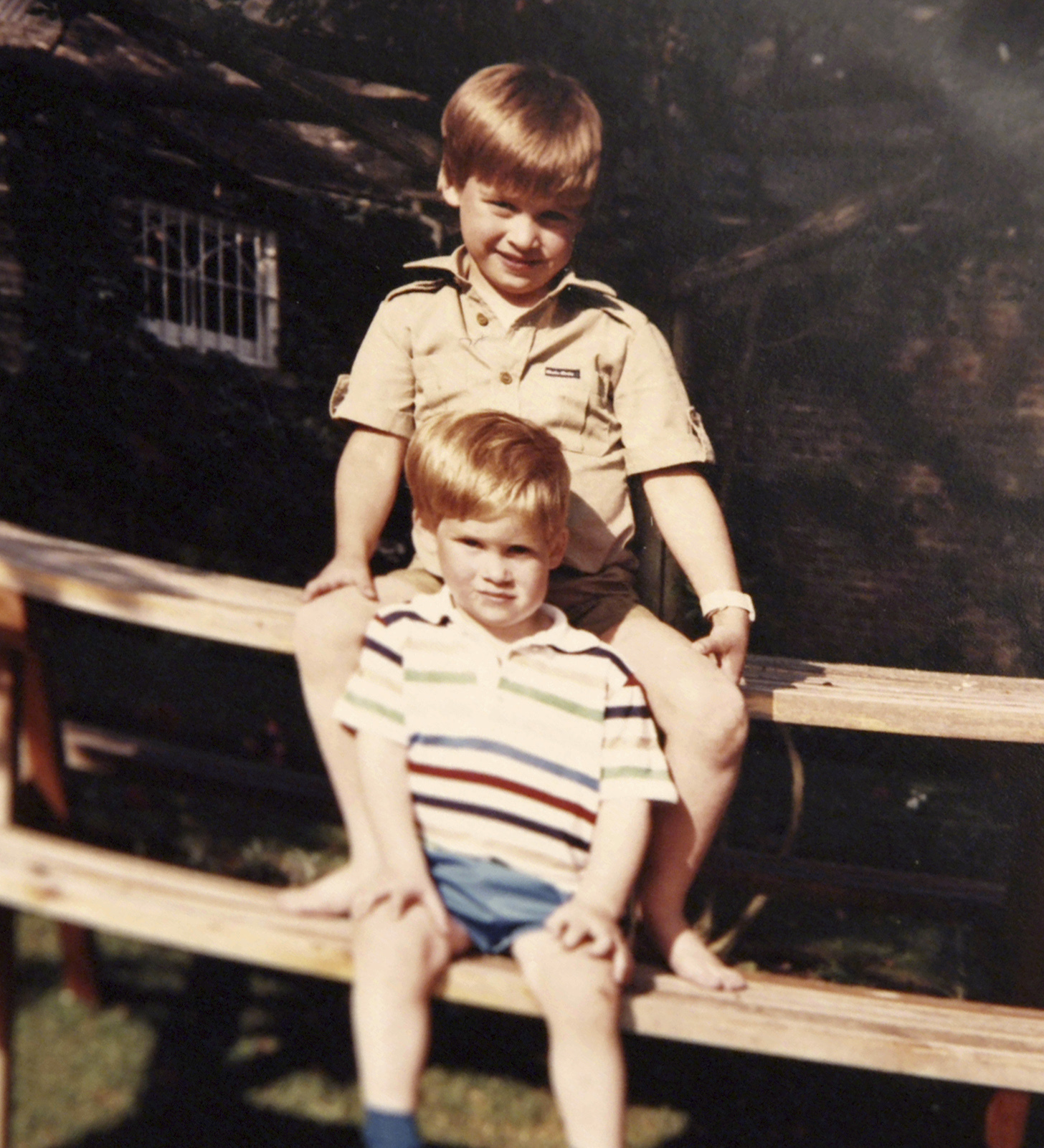 Prince William and Prince Harry sit on a picnic bench together. Photo / Getty Images